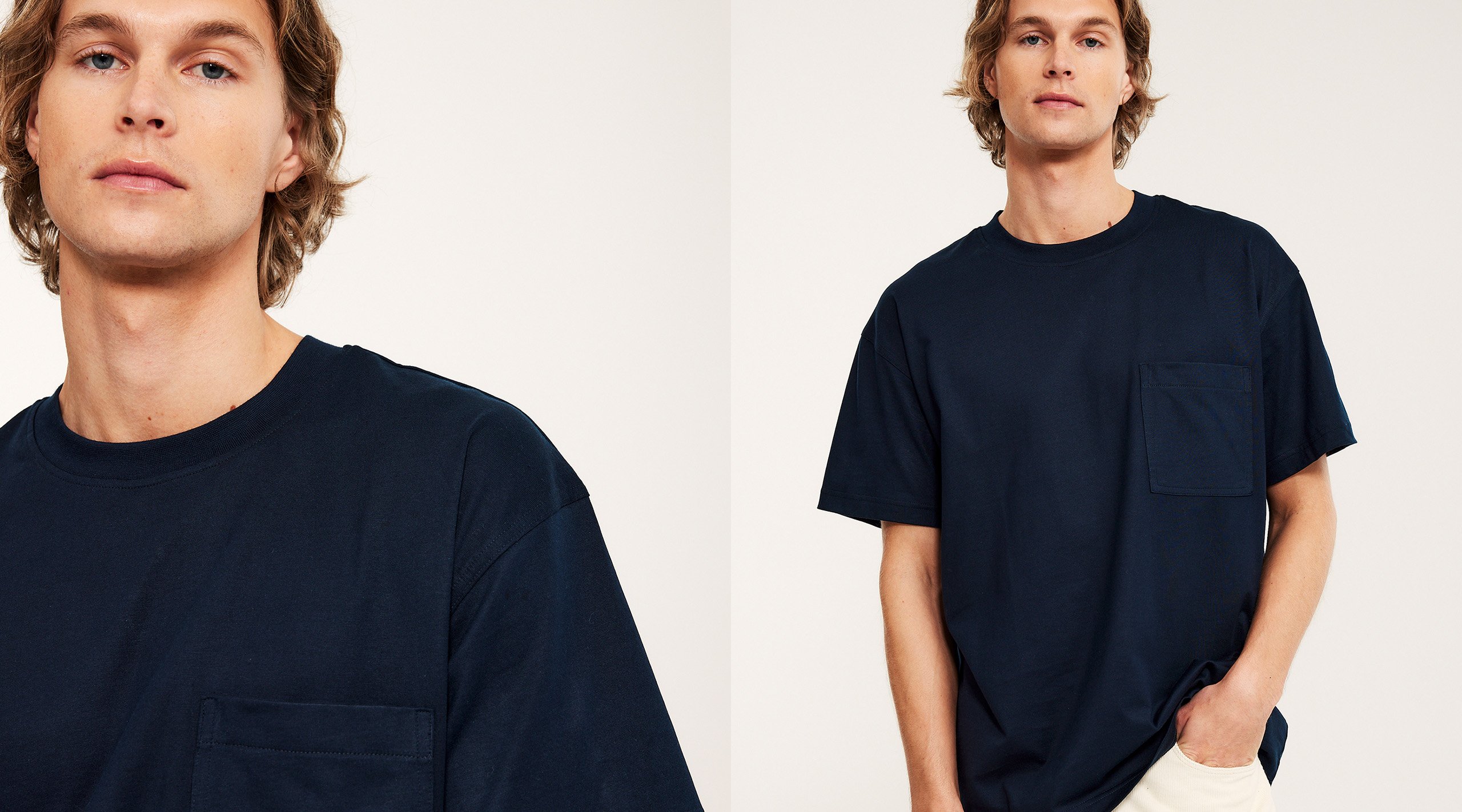 Mężczyzna ubrany w granatową koszulkę z kieszenią na piersi.