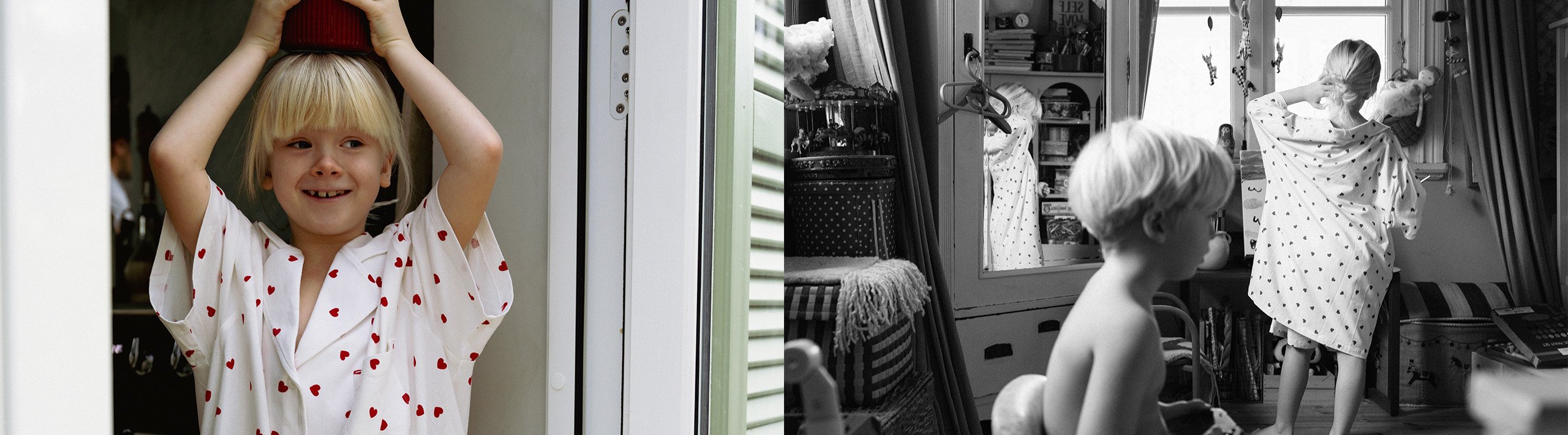 Tyttö ja poika samanlaisissa sydämin koristetuissa pyjamissa.