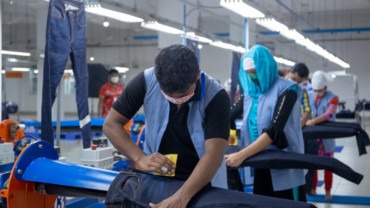 Man working in denim factory