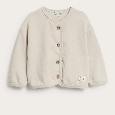 Kappahlilta vauvojen neulepuseroita ja neuletakkeja.