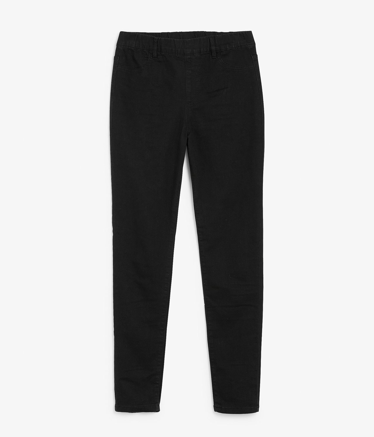 Forfra, svarte twill-treggings med elastisk midje, liggende flatt.