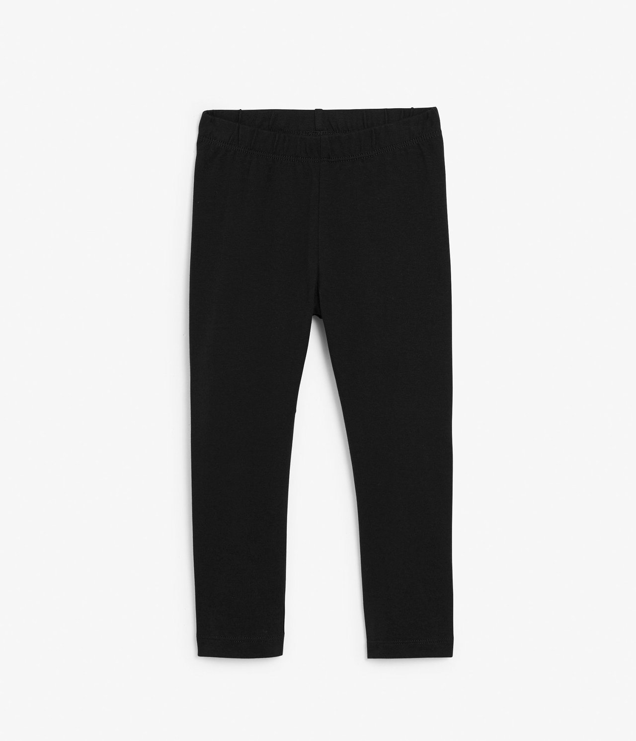 Frontvisning av svarte regular fit bomullsblanding leggings for barn med elastisk midje, flatt lagt.