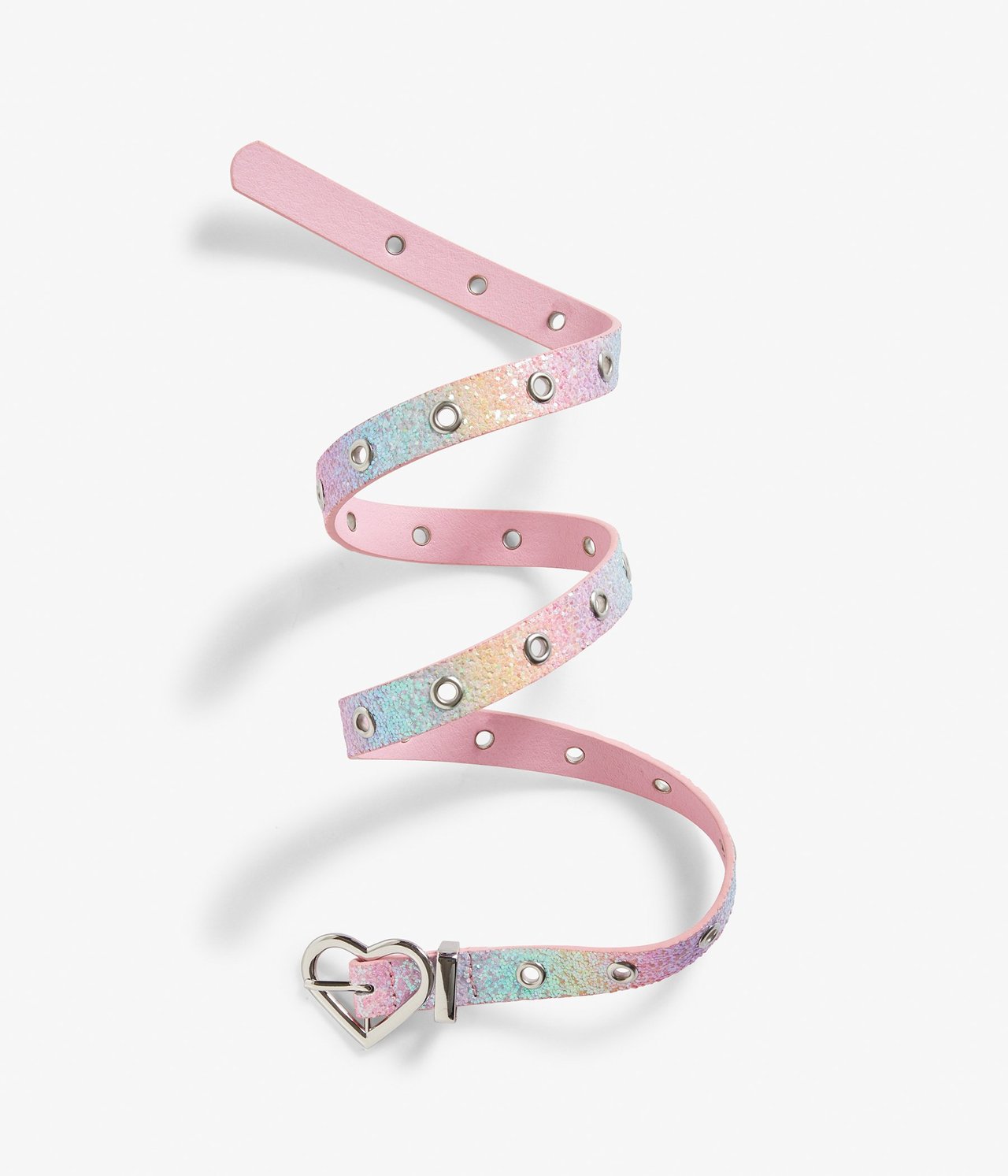 Ovanifrån: Barnskärp i rosa med regnbågsglitter, silverfärgade öljetter och hjärtformat spänne.