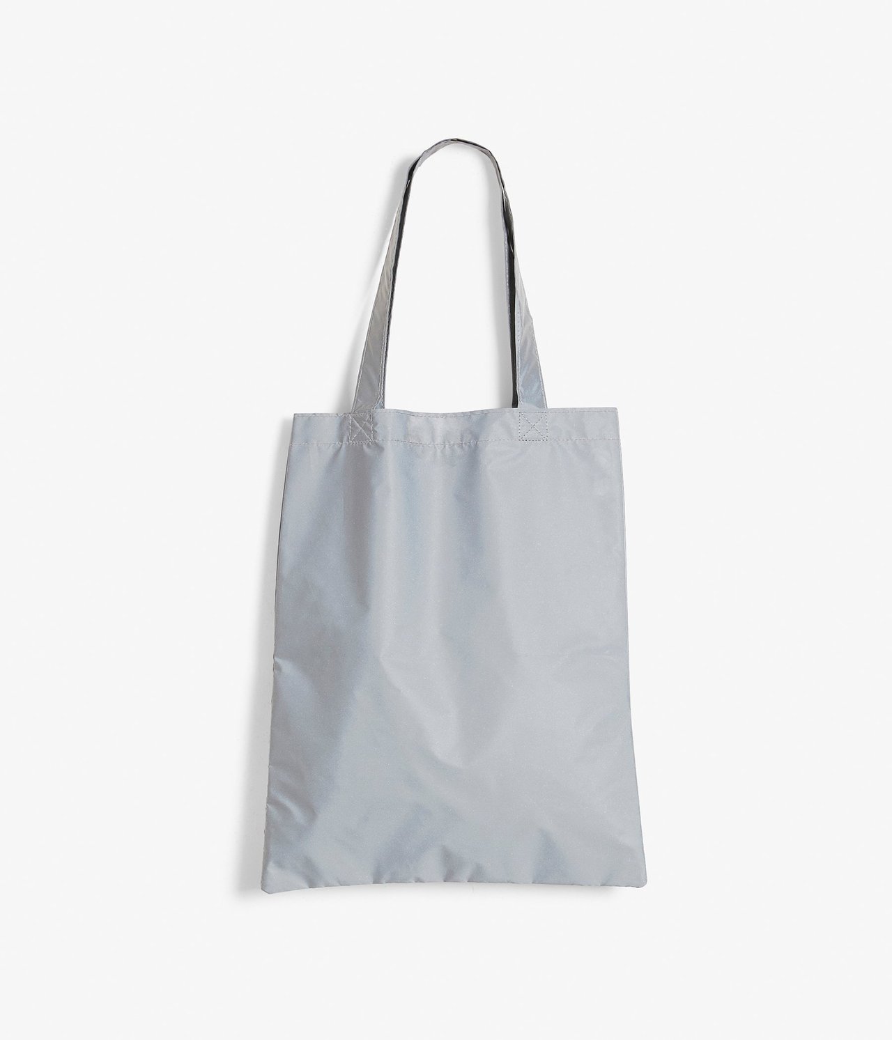 Heijastavaa kangasta oleva kangaskassi