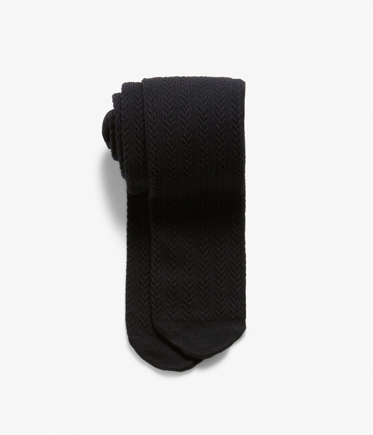 Widok z góry na złożone czarne rajstopy z warkoczowym splotem z mieszanki bawełny.