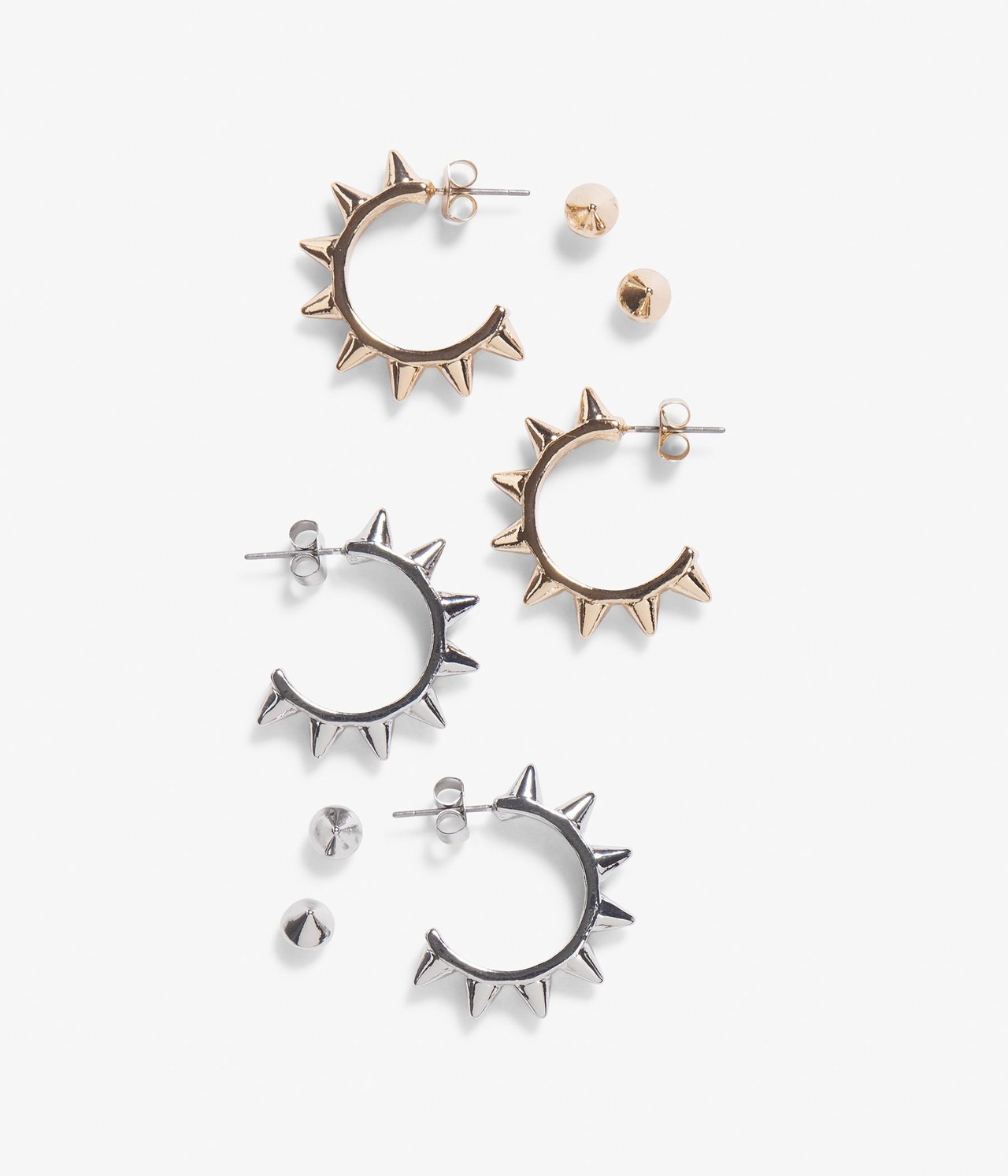 Widok z góry na 4-pak złotych i srebrnych metalowych kolczyków: kolce koła i okrągłe sztyfty.