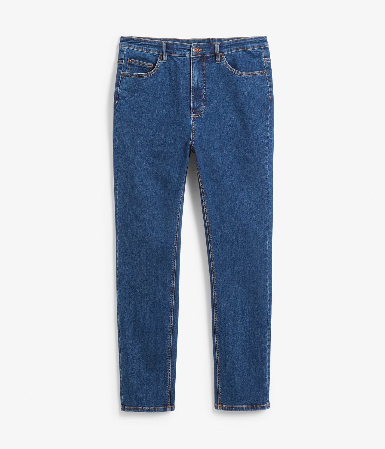 Edestä: Siniset denim-slim-farkut korkealla vyötäröllä ja ruskeilla tikkauksilla.