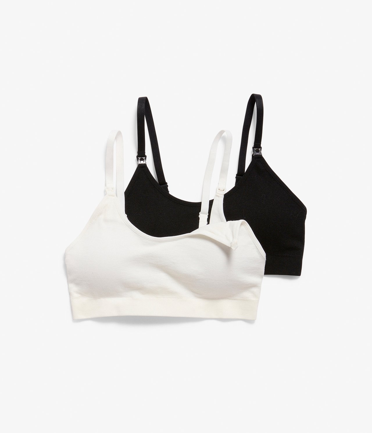 Forfra: To ribbestrikkede amme-BH-er, en offwhite, en svart, med justerbare stropper.