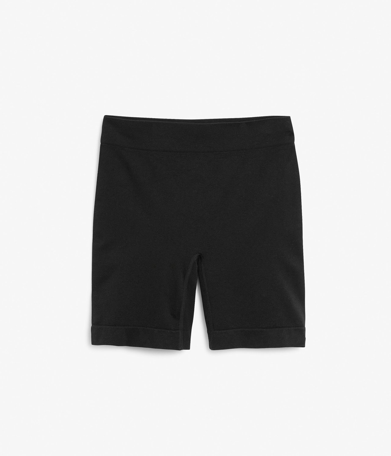 Frontvisning av svarte sømløse shorts med høy midje i polyamid og elastan.