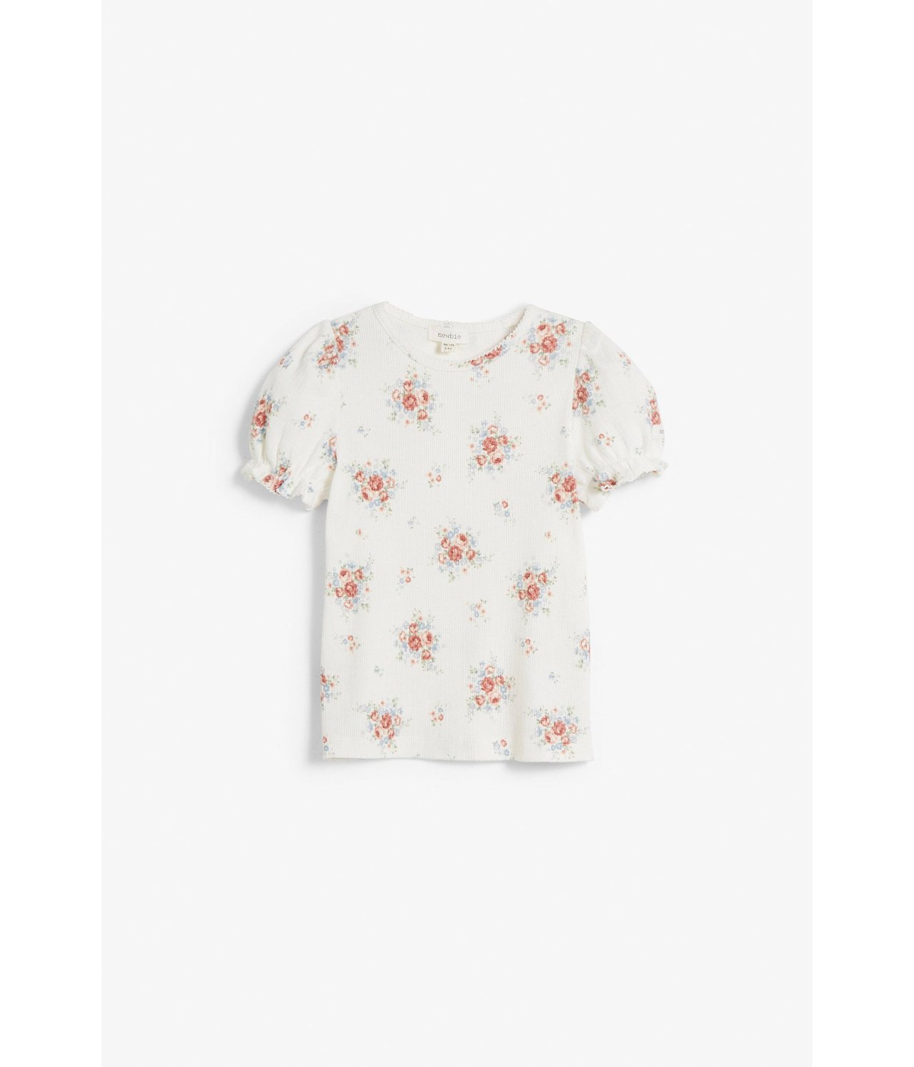 Kukkakuvioinen paita, jossa on puhvihihat