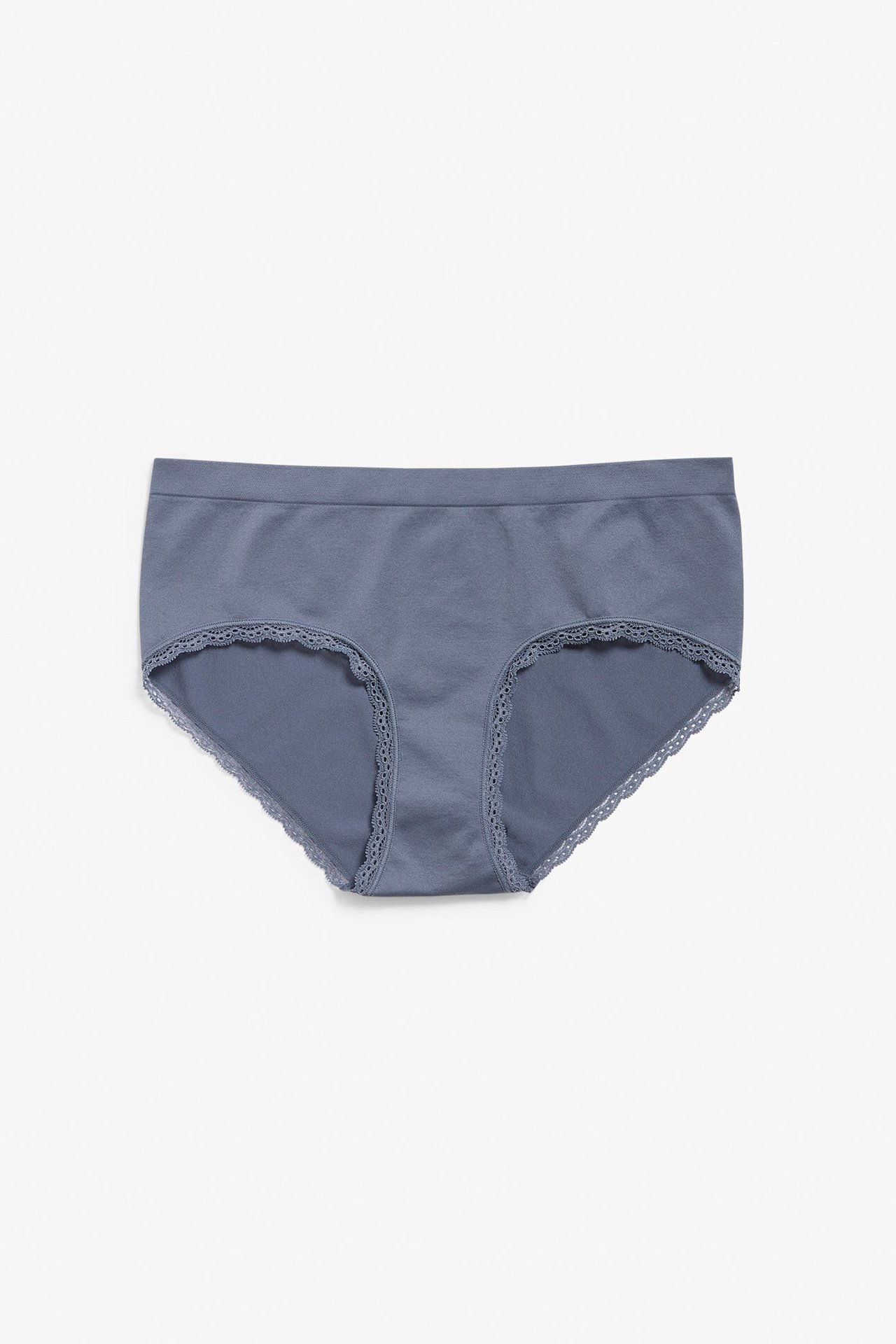 Forfra, grå sømløs hipstertruse med blondedetaljer.