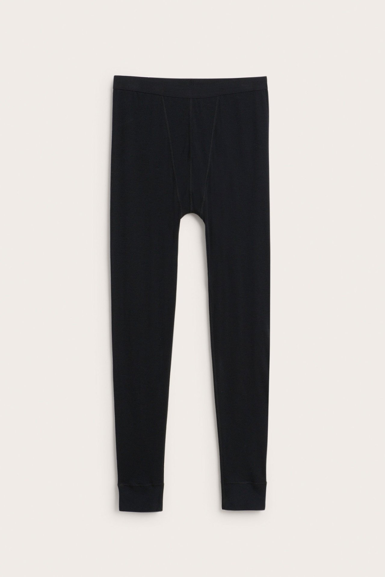 Widok z przodu czarnych kalesonów z wełny merynosów z elastycznym pasem.