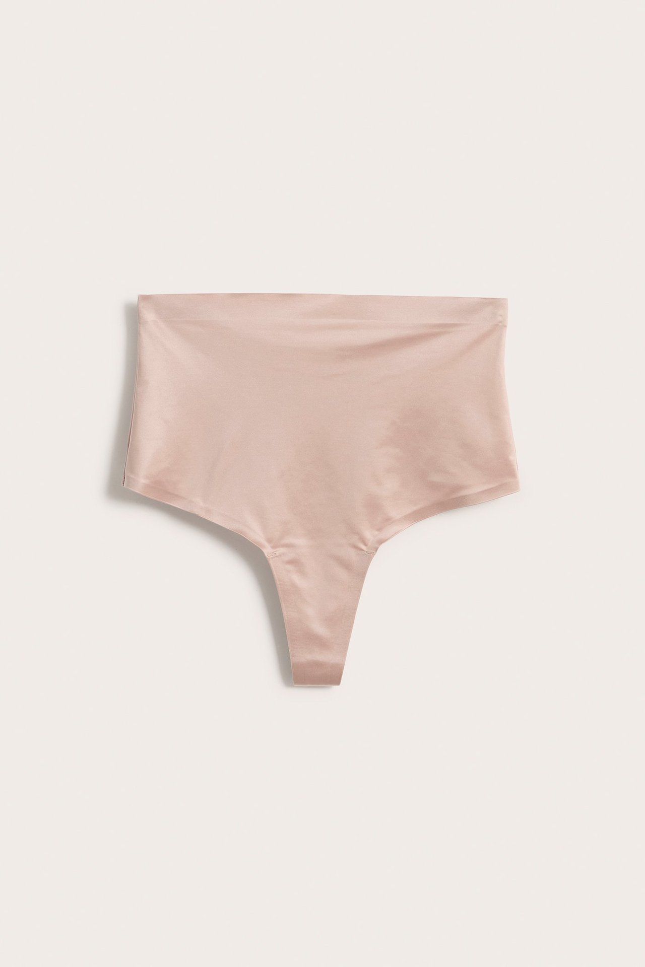 Frontvisning av en rosa høytlivs shaping-string i glatt satinmikro-stoff.