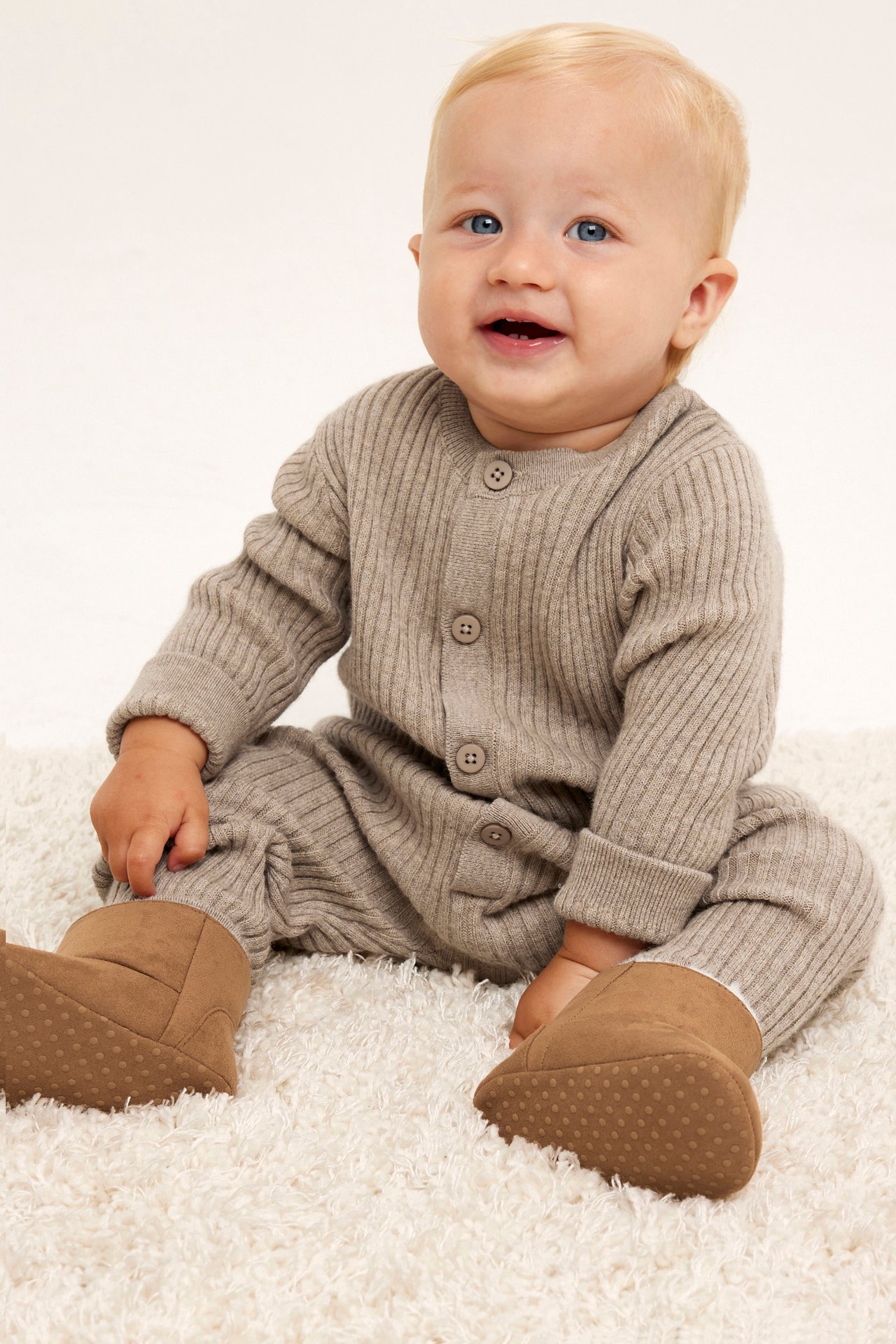 Stickad jumpsuit i ull baby - Melerad beige - 1