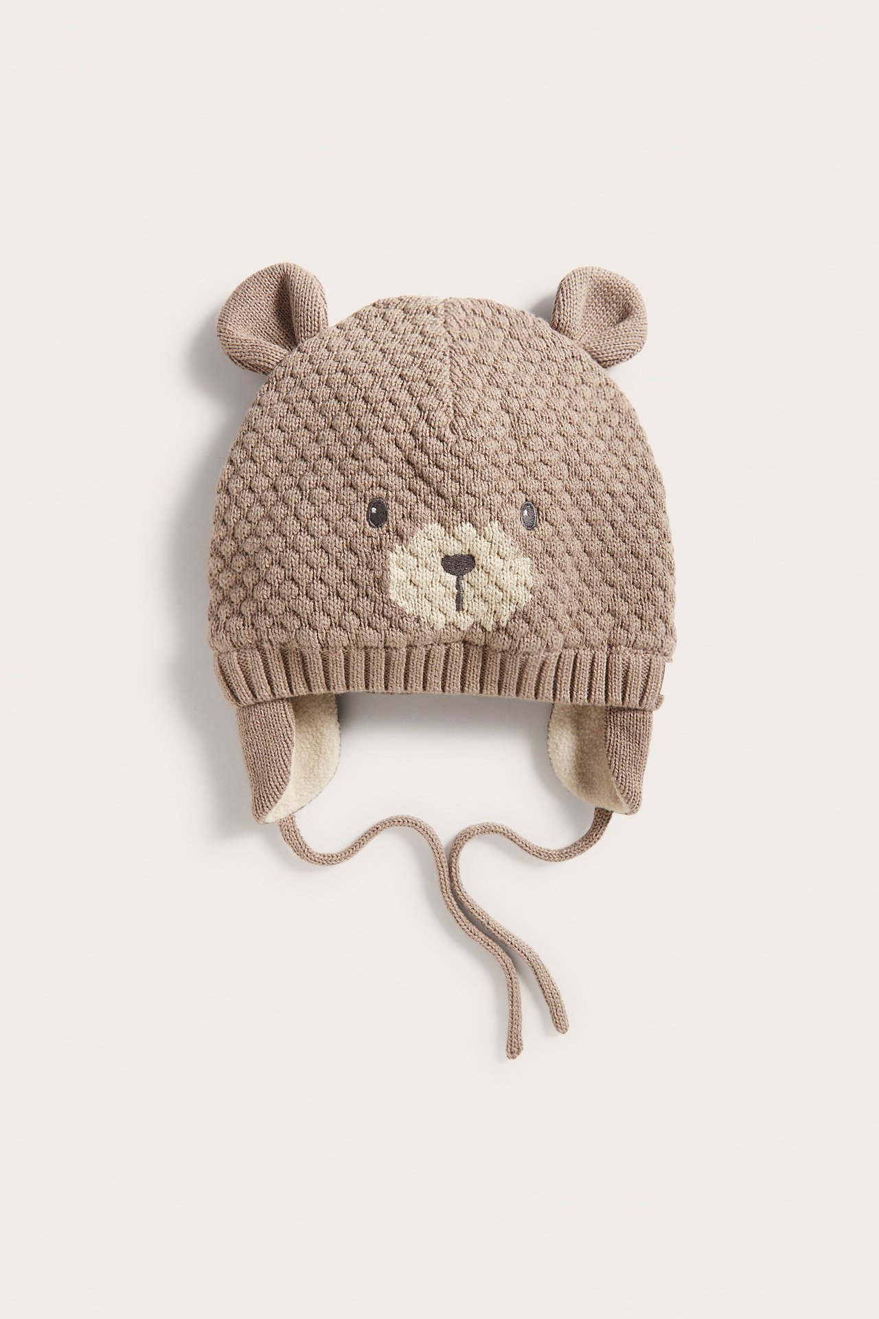 Lue med knytebånd - Mørk beige - 1
