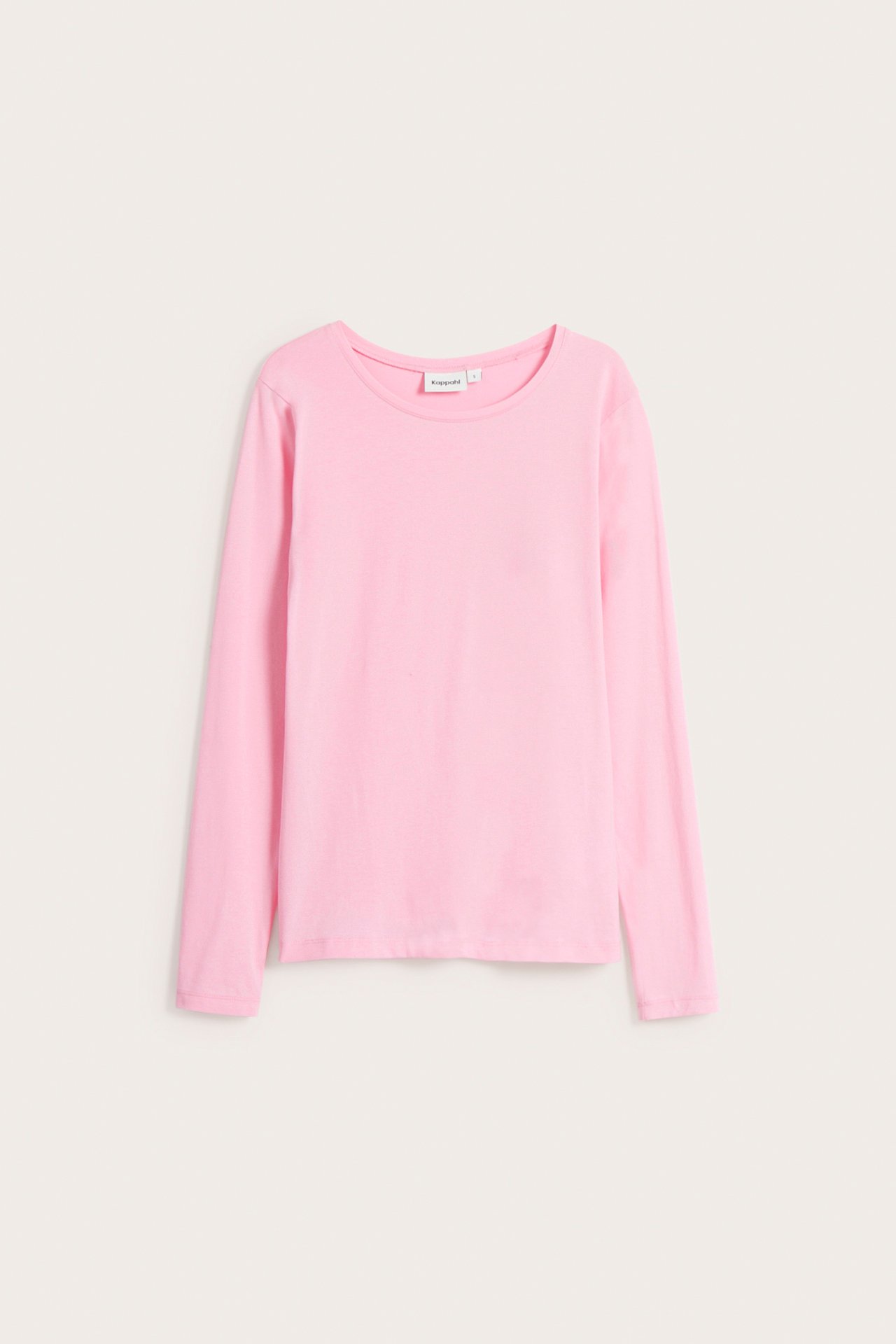 Frontvy av en enfärgad rosa långärmad bastopp med rund hals.