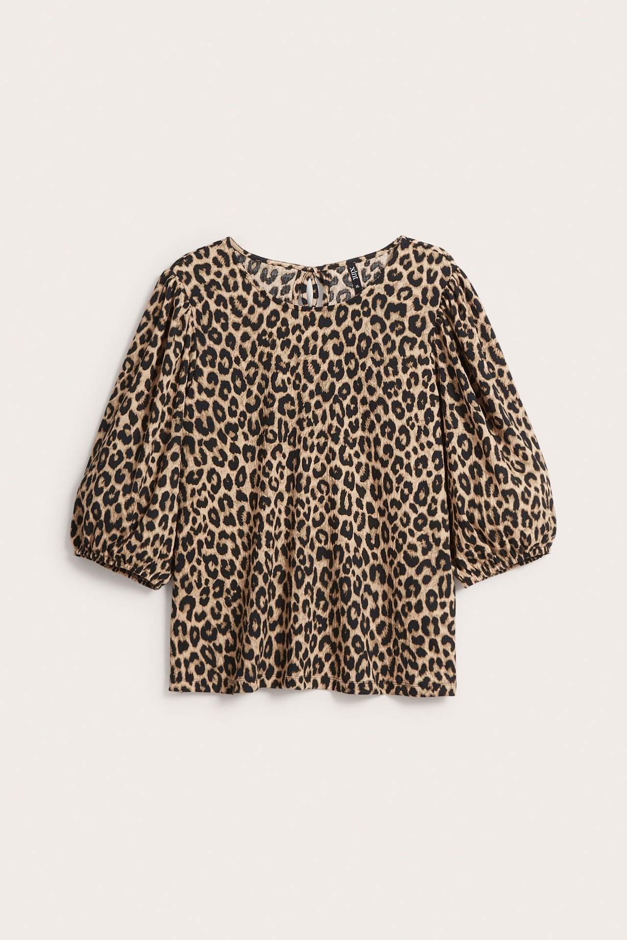 Leopardikuvioinen paita