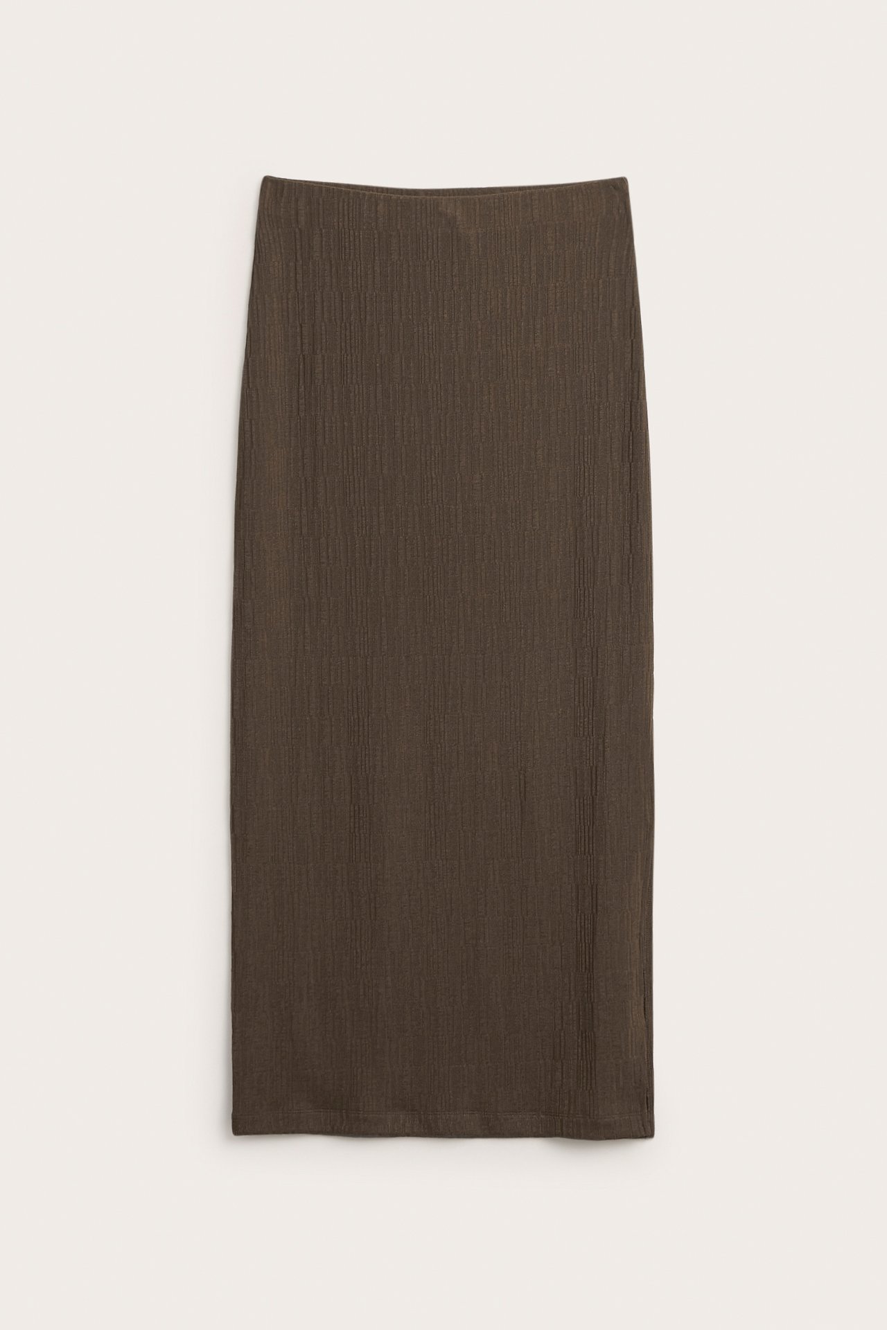 Frontvy av en mörkbrun lång jerseykjol med texturerad yta.