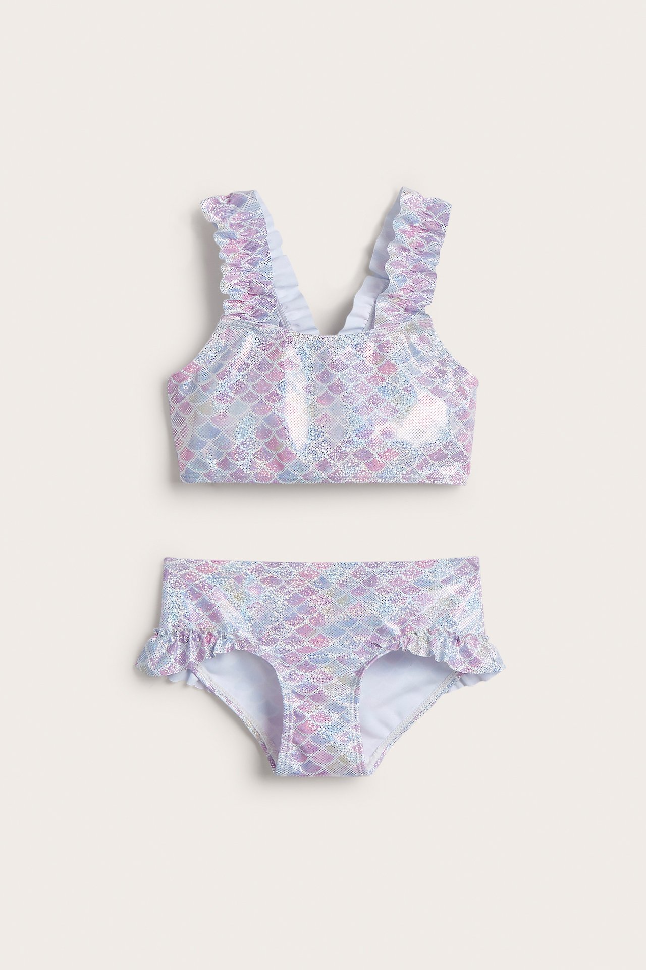 Dziecięce brokatowe bikini we wzór syrenich łusek, z falbankami na ramiączkach i majtkach.