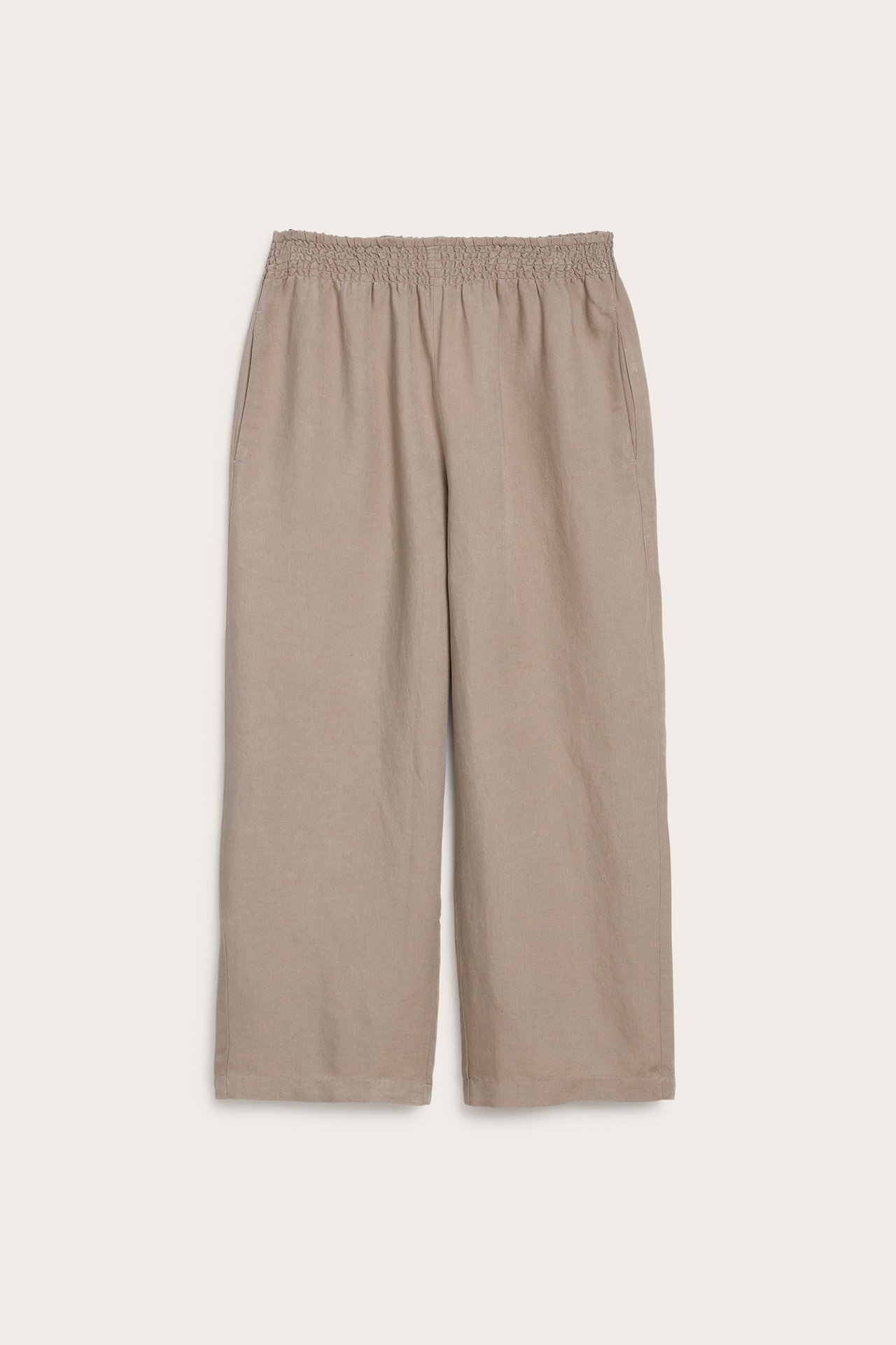 Frontvisning: Mørk beige linblanding bukser med elastisk midje og vide ben.