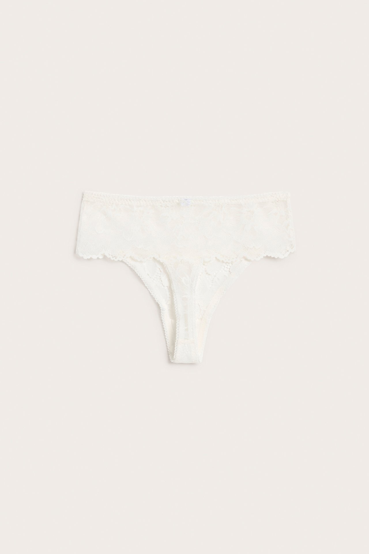 Forfra, hvit blondestringtrusa for dame.