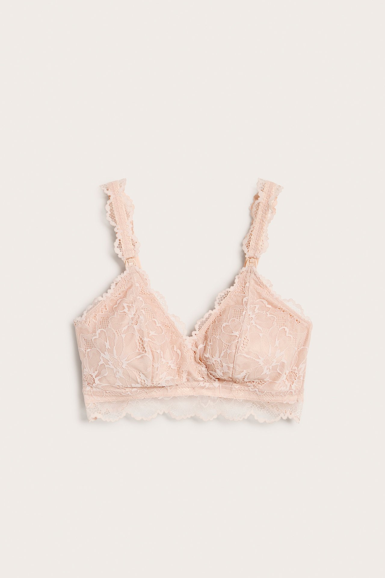 Forfra, lys rosa amme-BH i blonde med justerbare stropper og spenner foran.