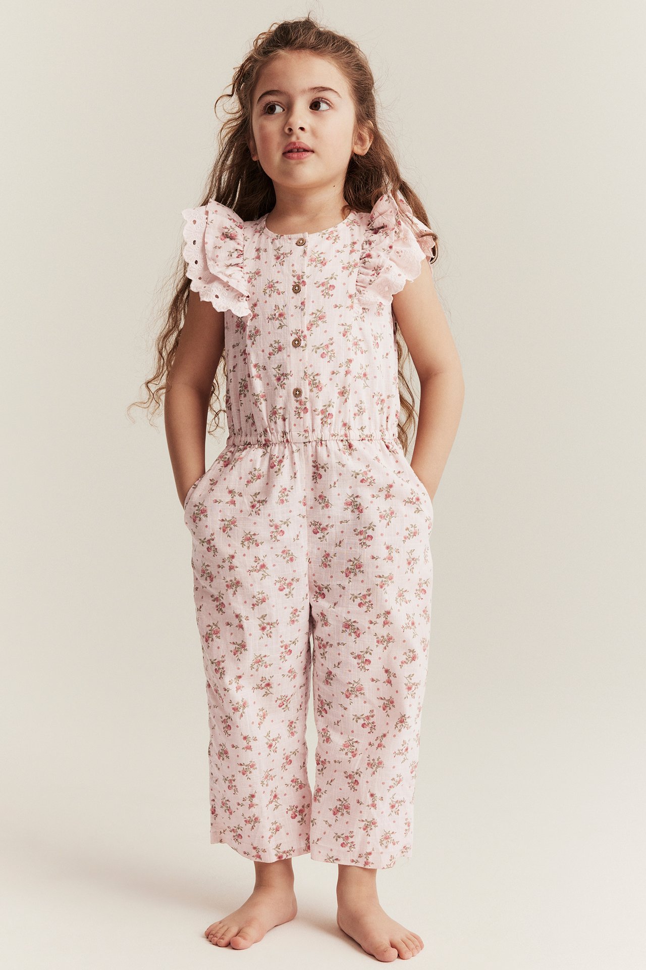 Blommig jumpsuit med volang - Ljusrosa - 4