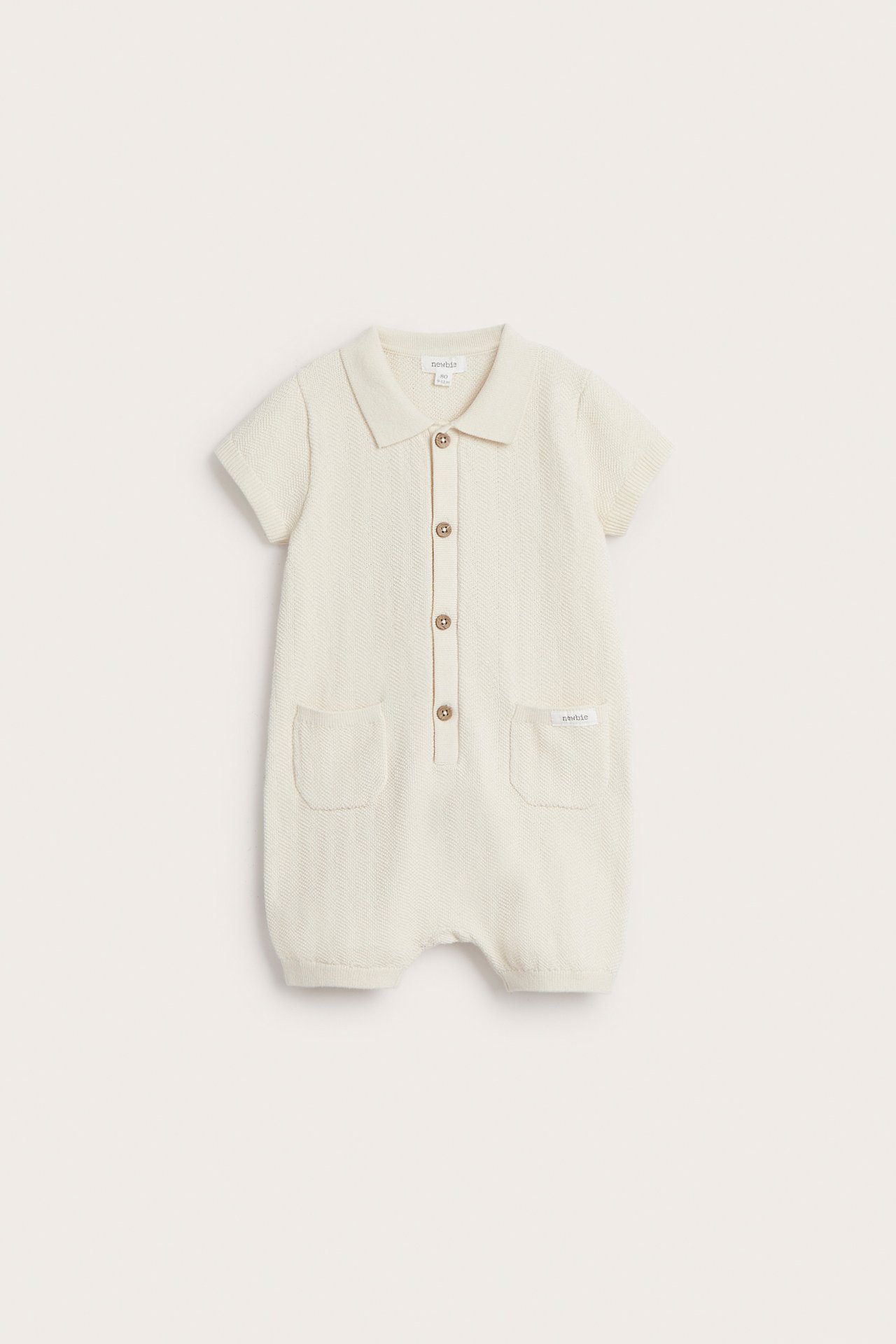 Strikket playsuit