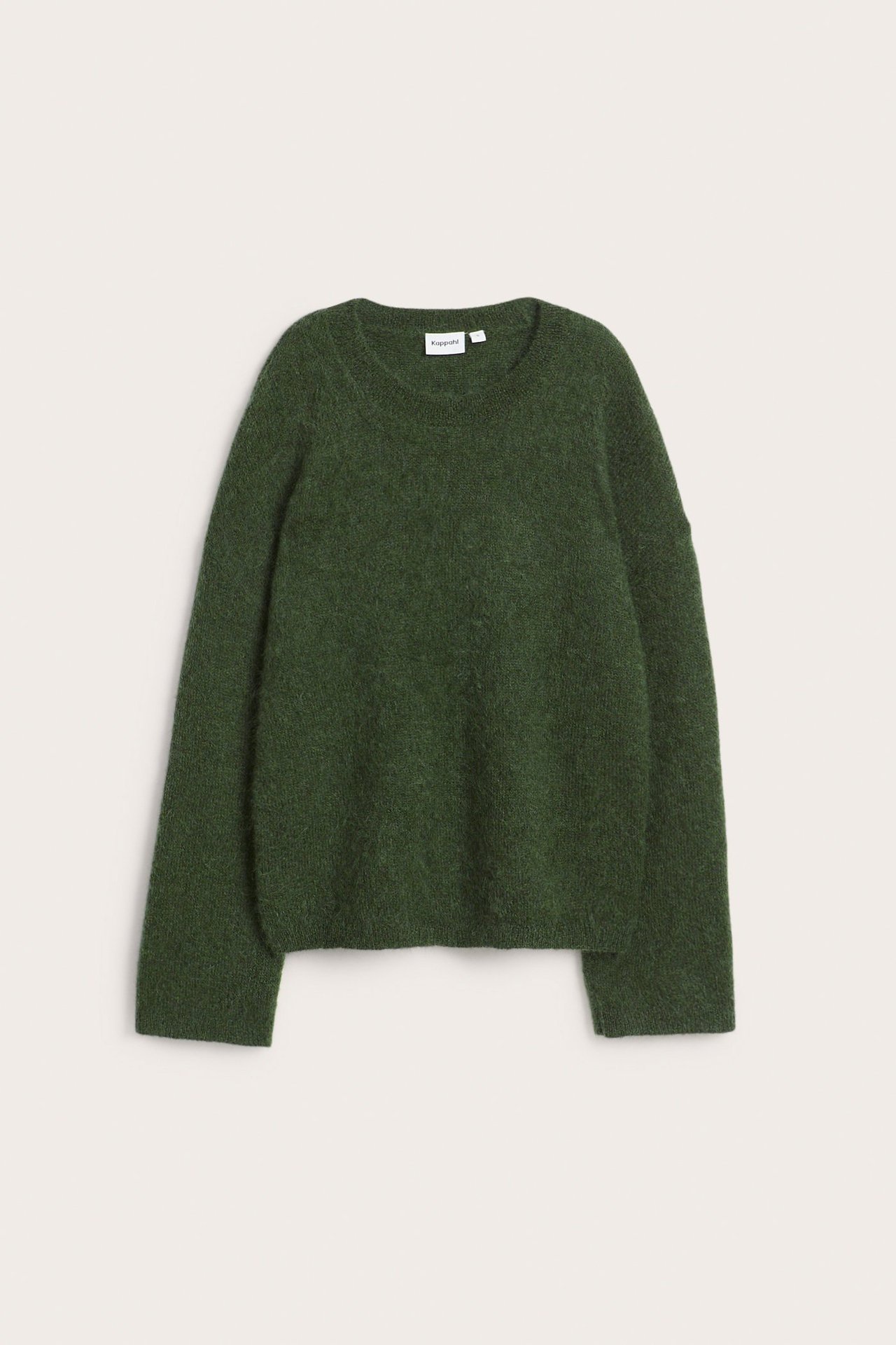 Edestä, vihreä oversized mohairsekoiteneulepaita pyöreällä pääntiellä.