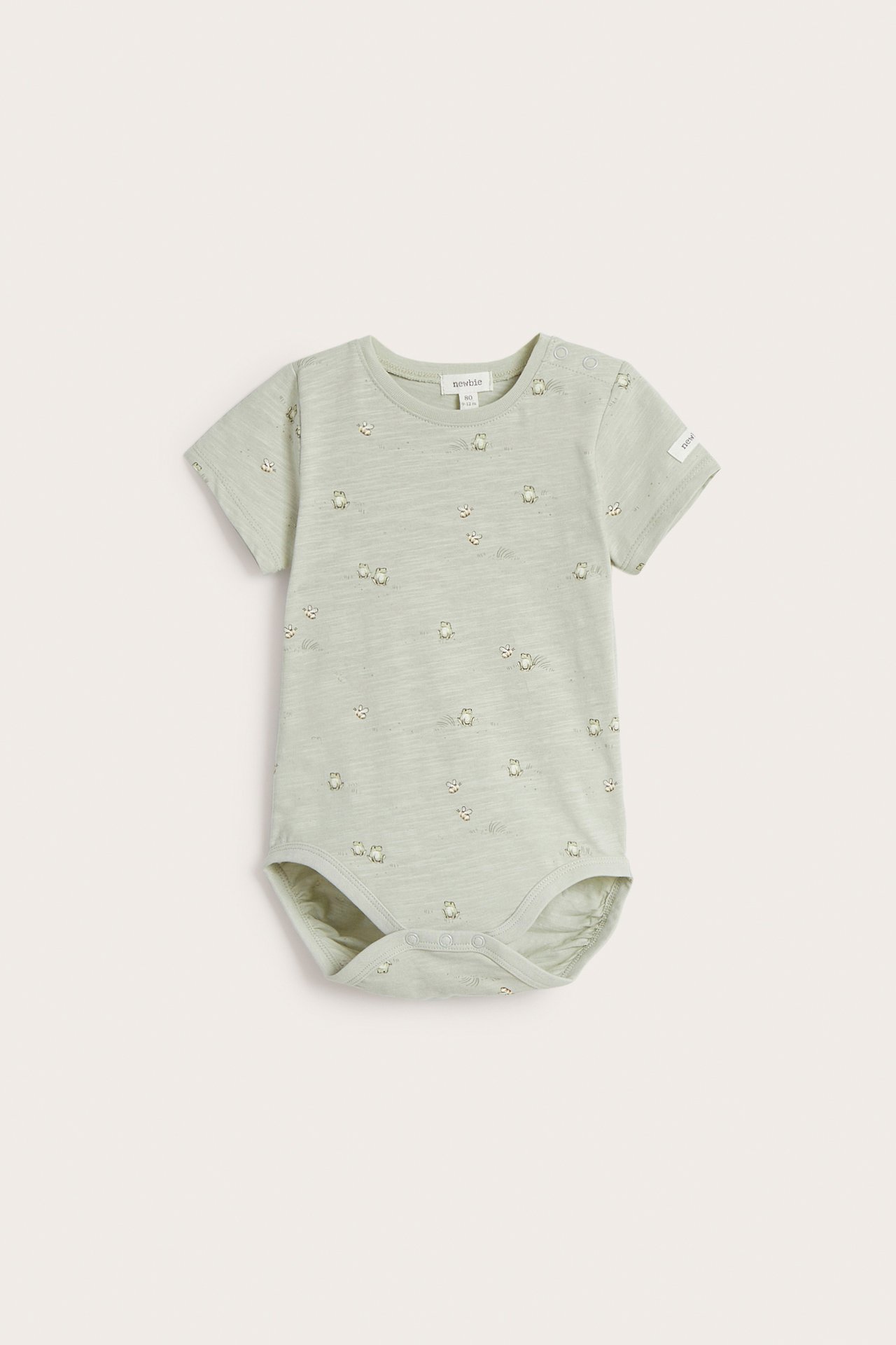 Frontvisning: Lysegrønn kortermet slub-jersey body til baby med froskemønster, trykknapper.