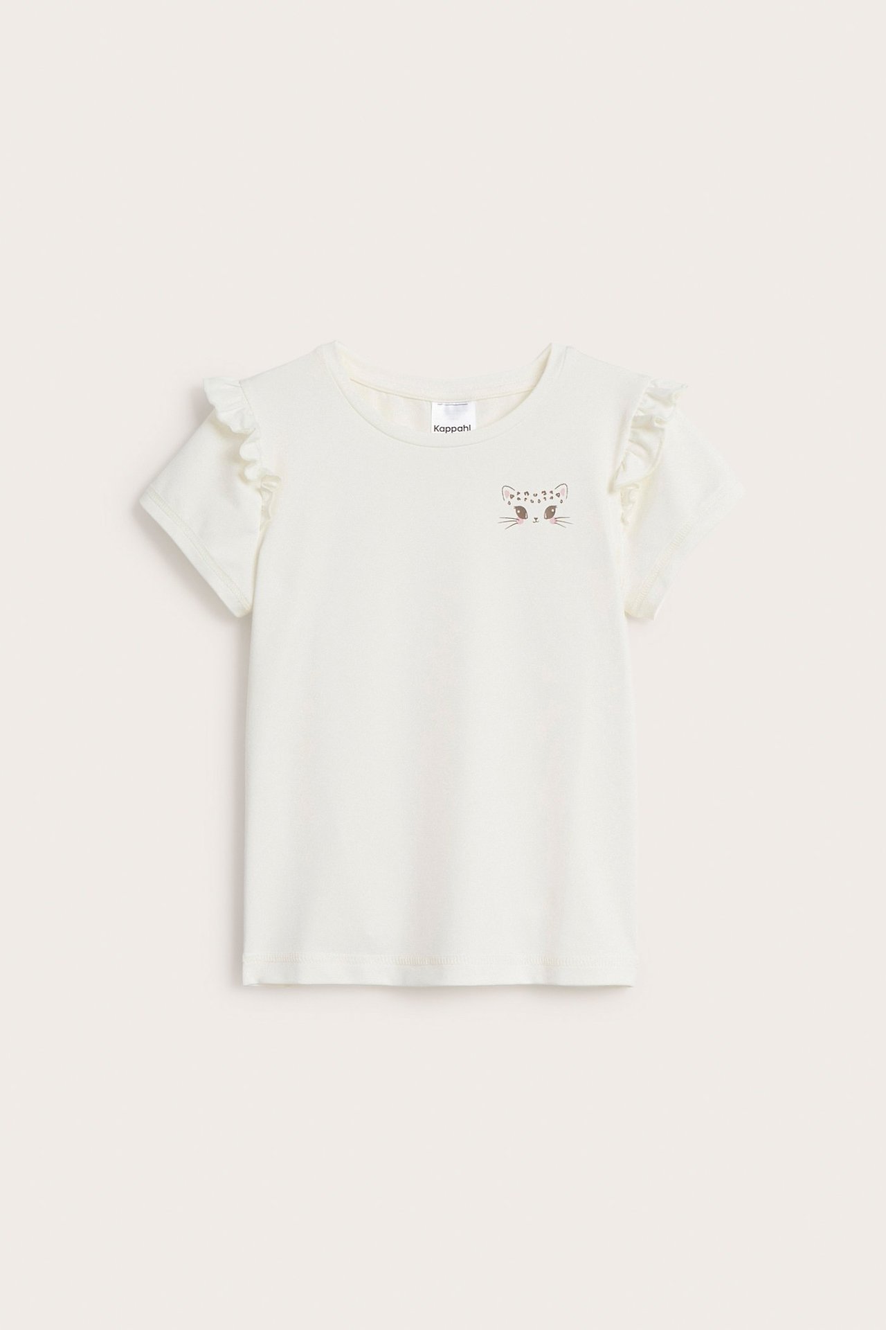 Frontvy av en offwhite träningstopp för barn med volangärmar och kattansikte-tryck.