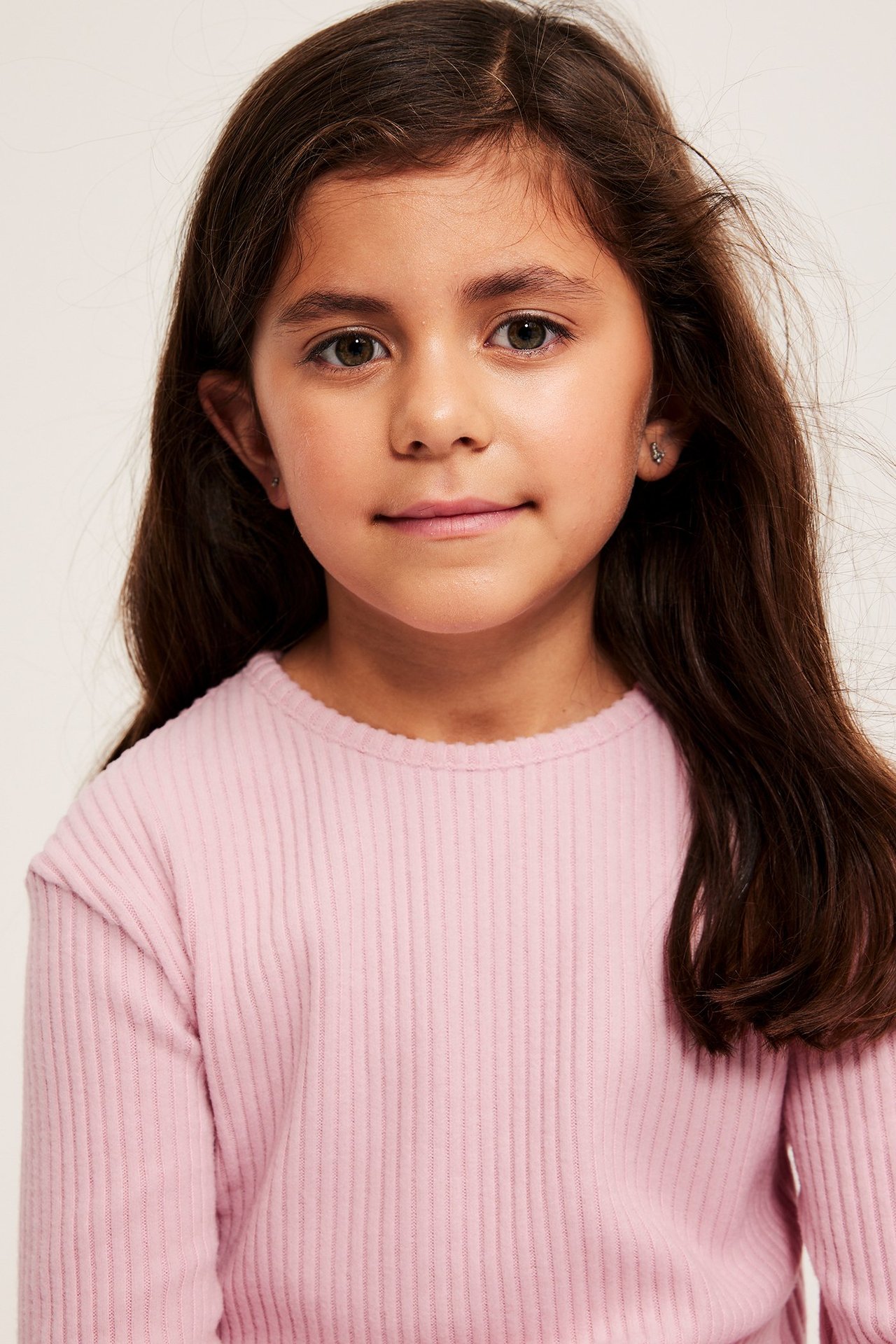 Långärmad peplumtopp