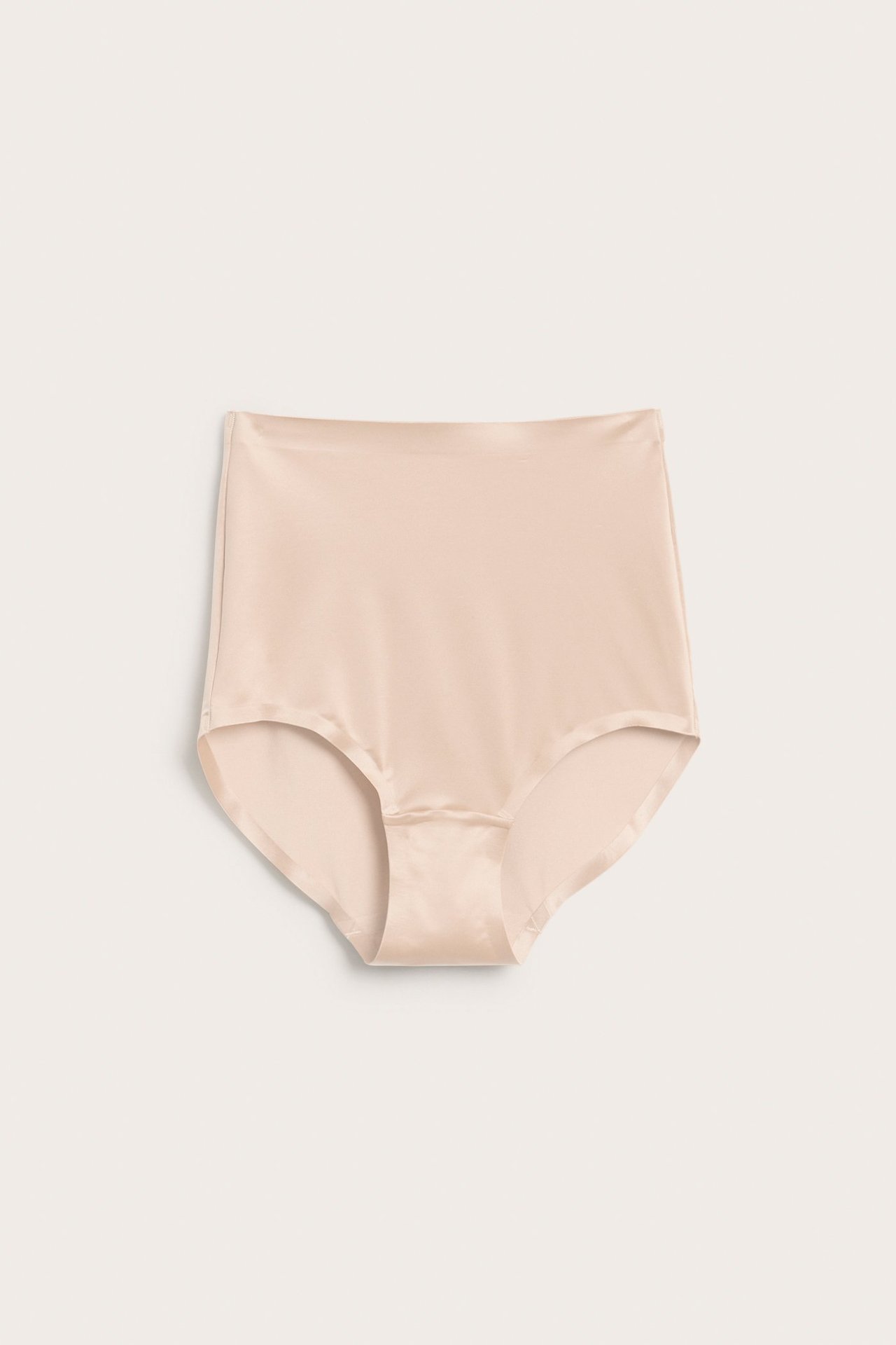Forfra: Lys rosa high-waist shaping-truse i glatt satinmicro med sømløs finish.