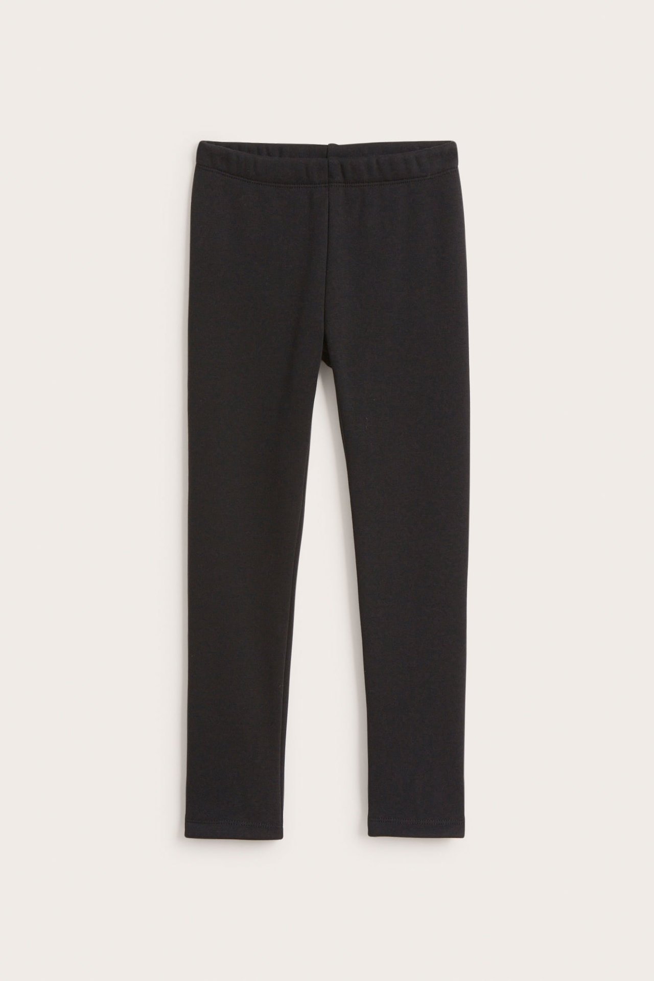 Forfra svarte, ankellange leggings.