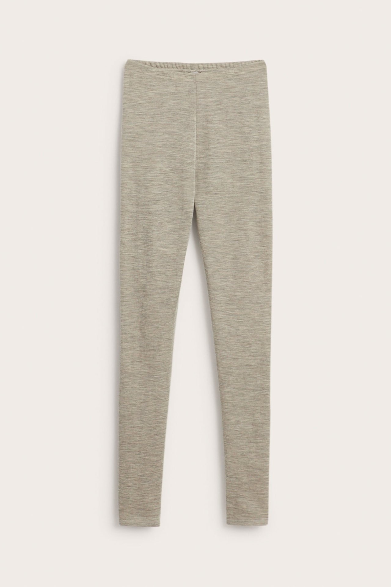 Front, hellange beige melange strikkede leggings.