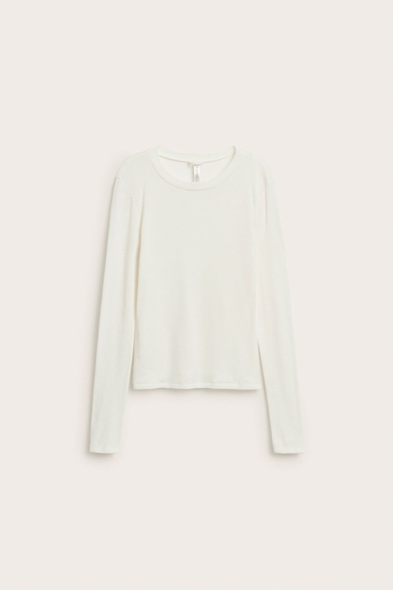 Forfra, off-white langermet kort topp med rund hals.