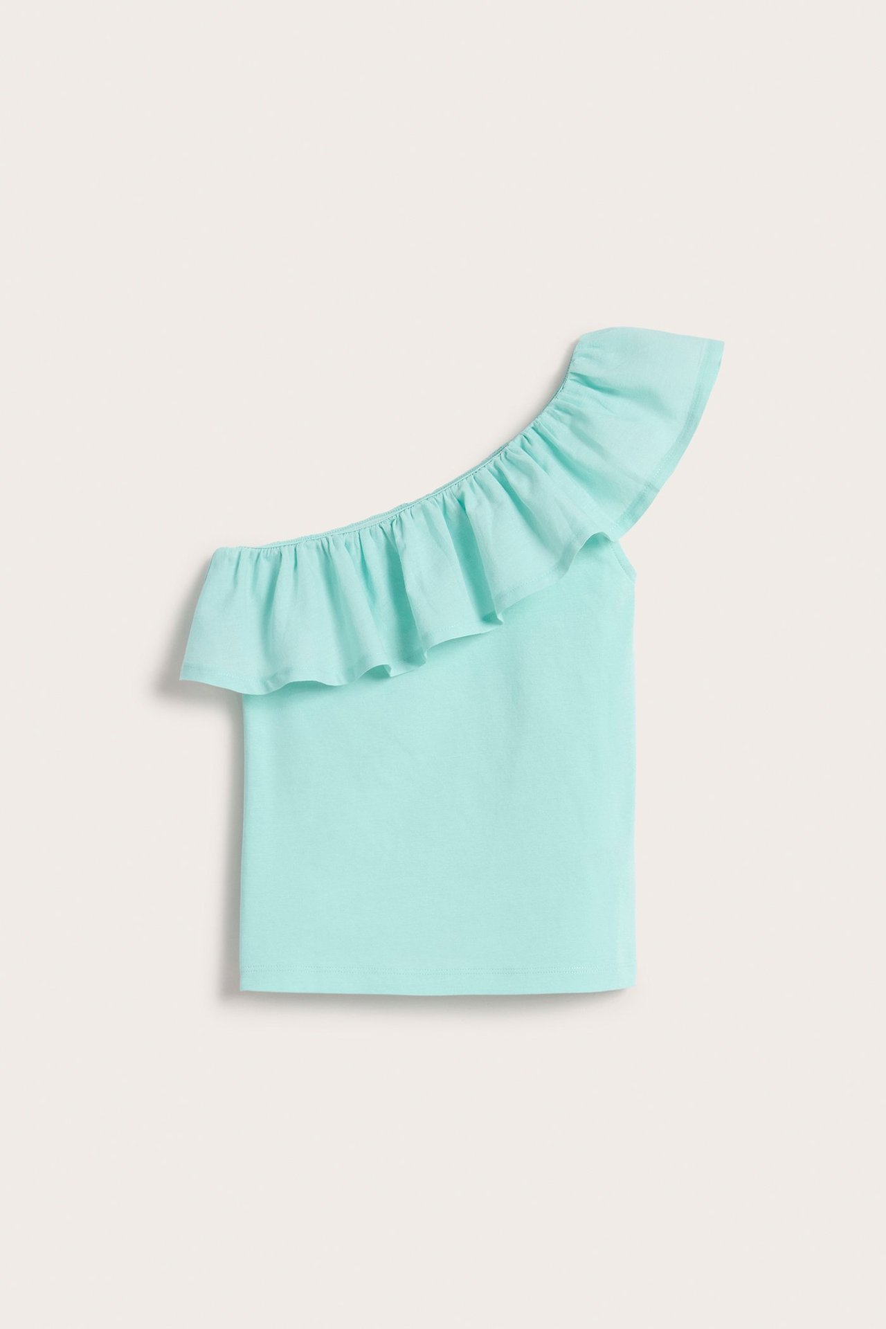 Framifrån, ljus turkos one shoulder-topp med vävd volang.