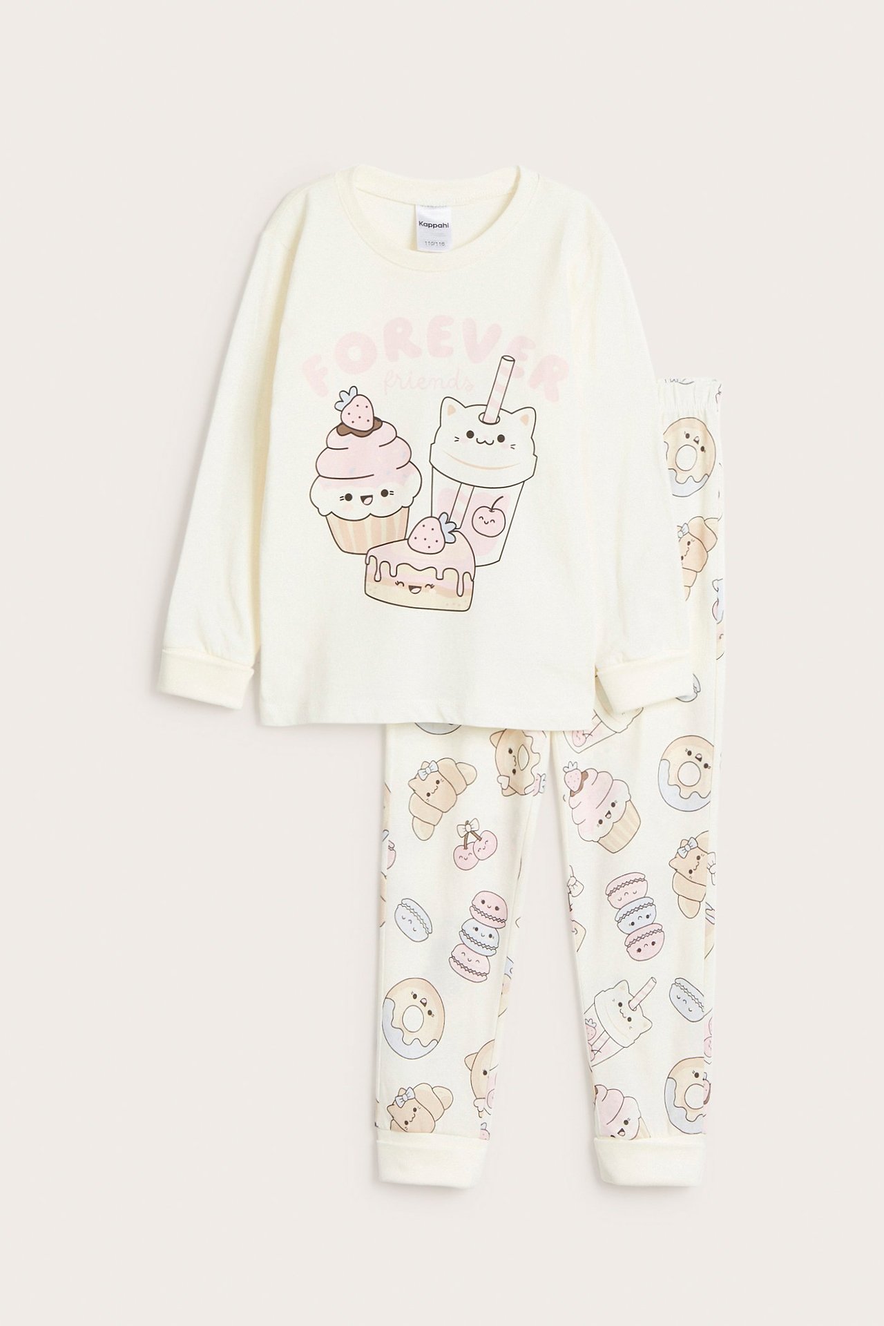 Widok z przodu beżowej piżamy bawełnianej dla dziecka z nadrukami deserów z kreskówek.