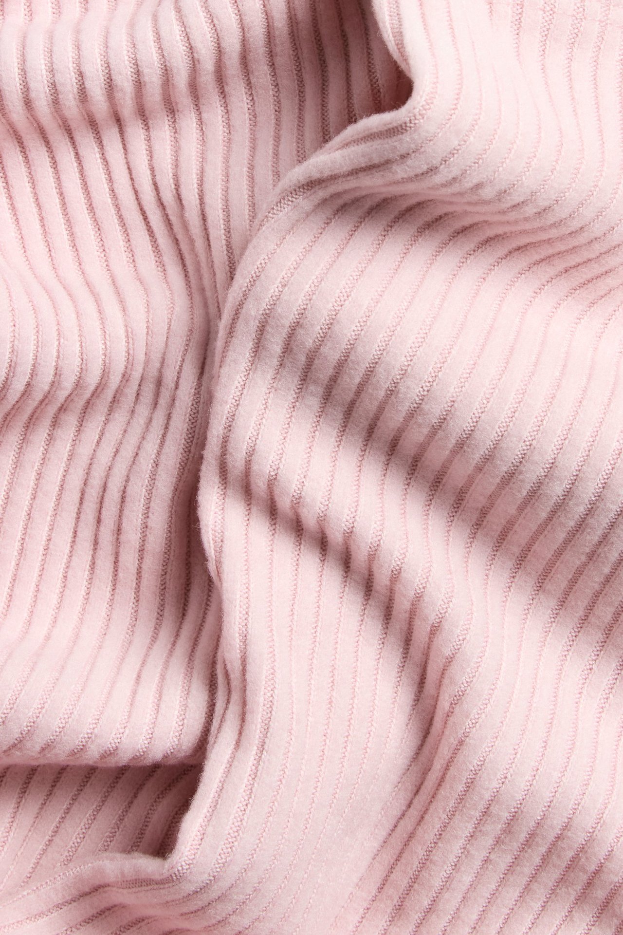 Vaaleanpunaiset ribbaiset leggingssit pehmeästä ribbaisesta kankaasta, yhtenäinen väri.