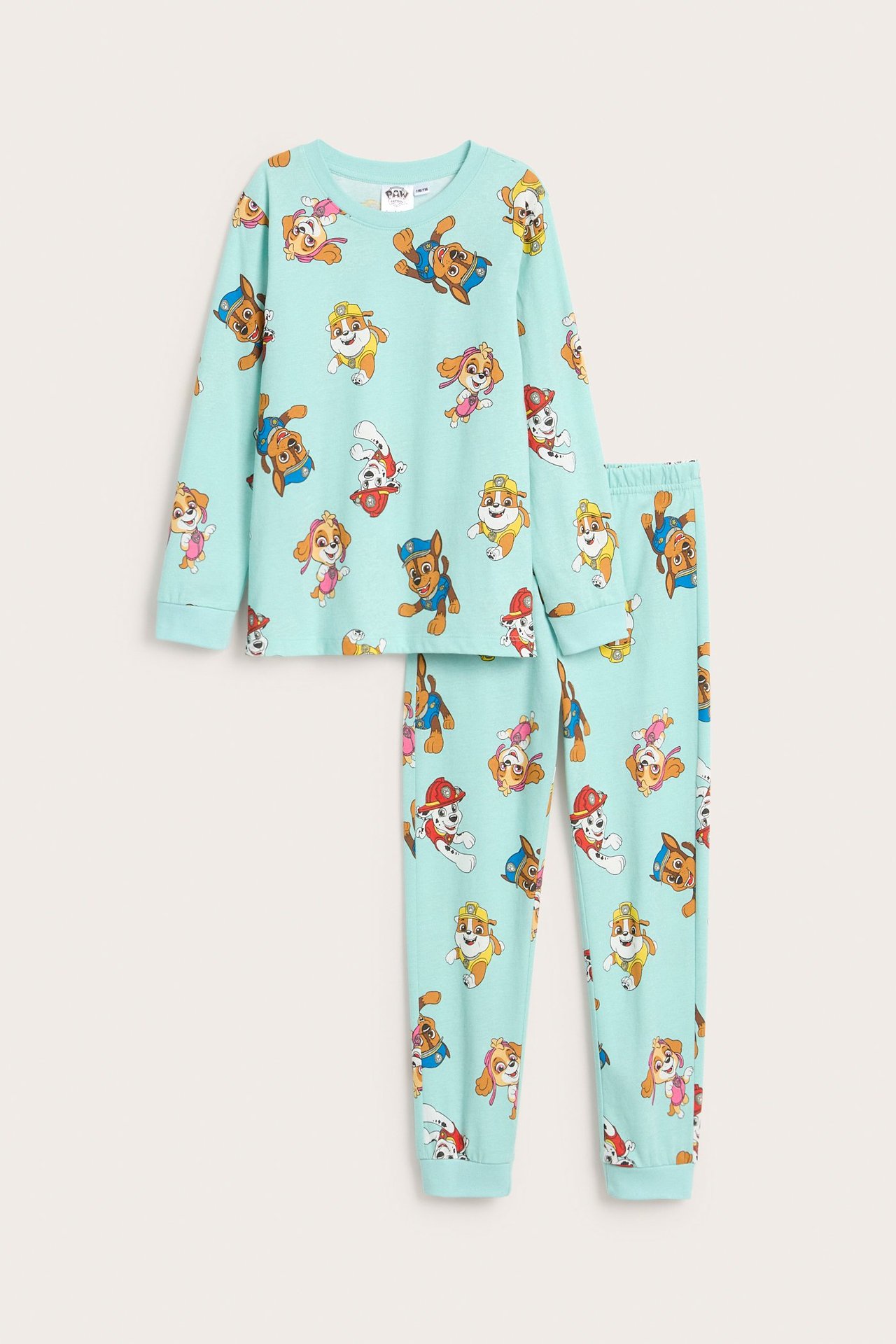 Edestä, lasten vaaleanturkoosi puuvillapyjama, jossa Ryhmä Hau -kuvio ja resorit hihansuissa ja lahkeissa.