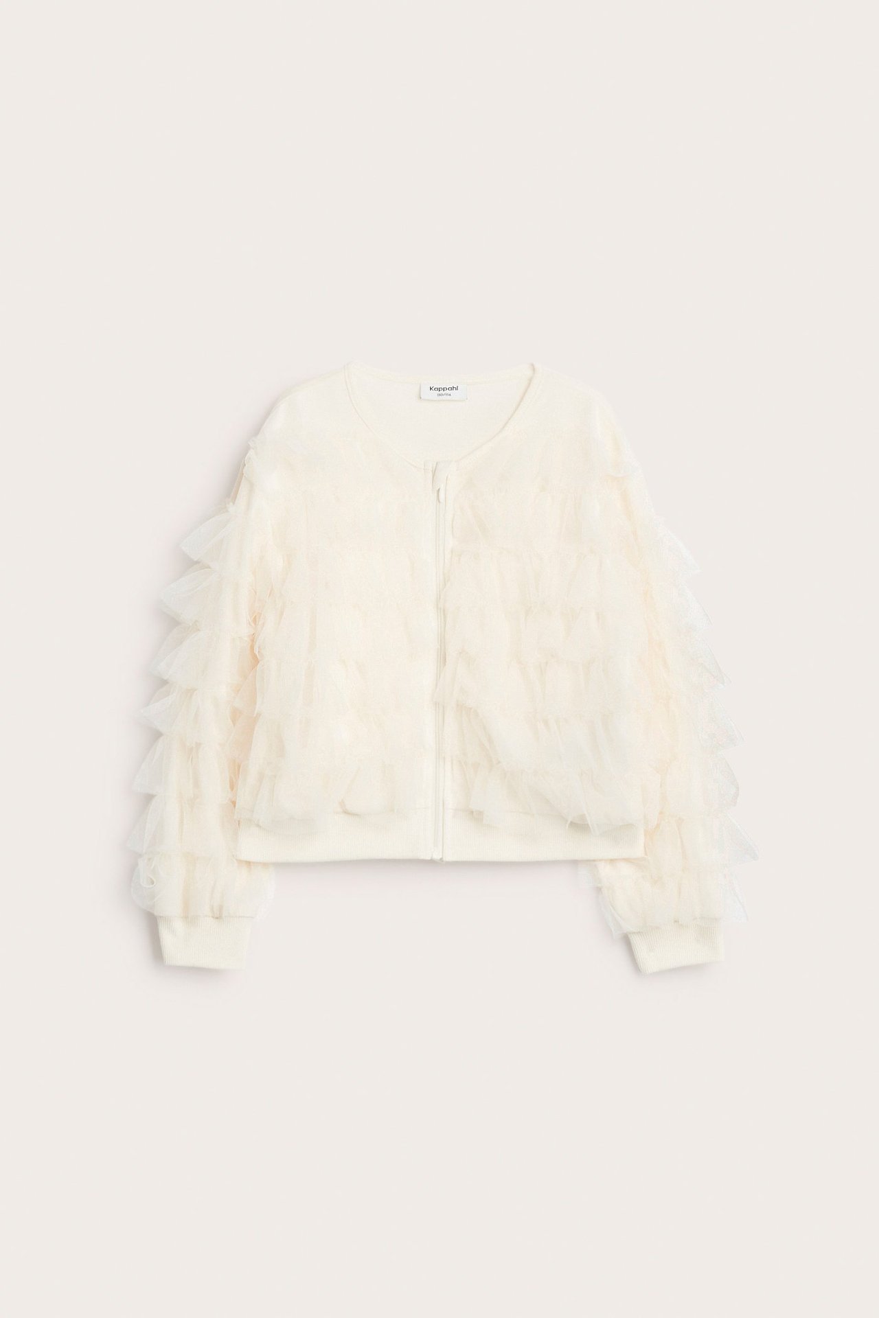Framifrån: Offwhite inomhusjacka för barn med volanger i mesh på ärmar och kropp, samt dragkedja.