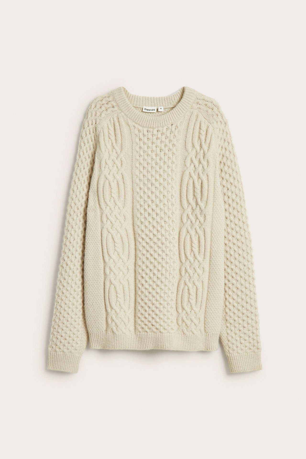 Sweter z dzianiny w warkocze