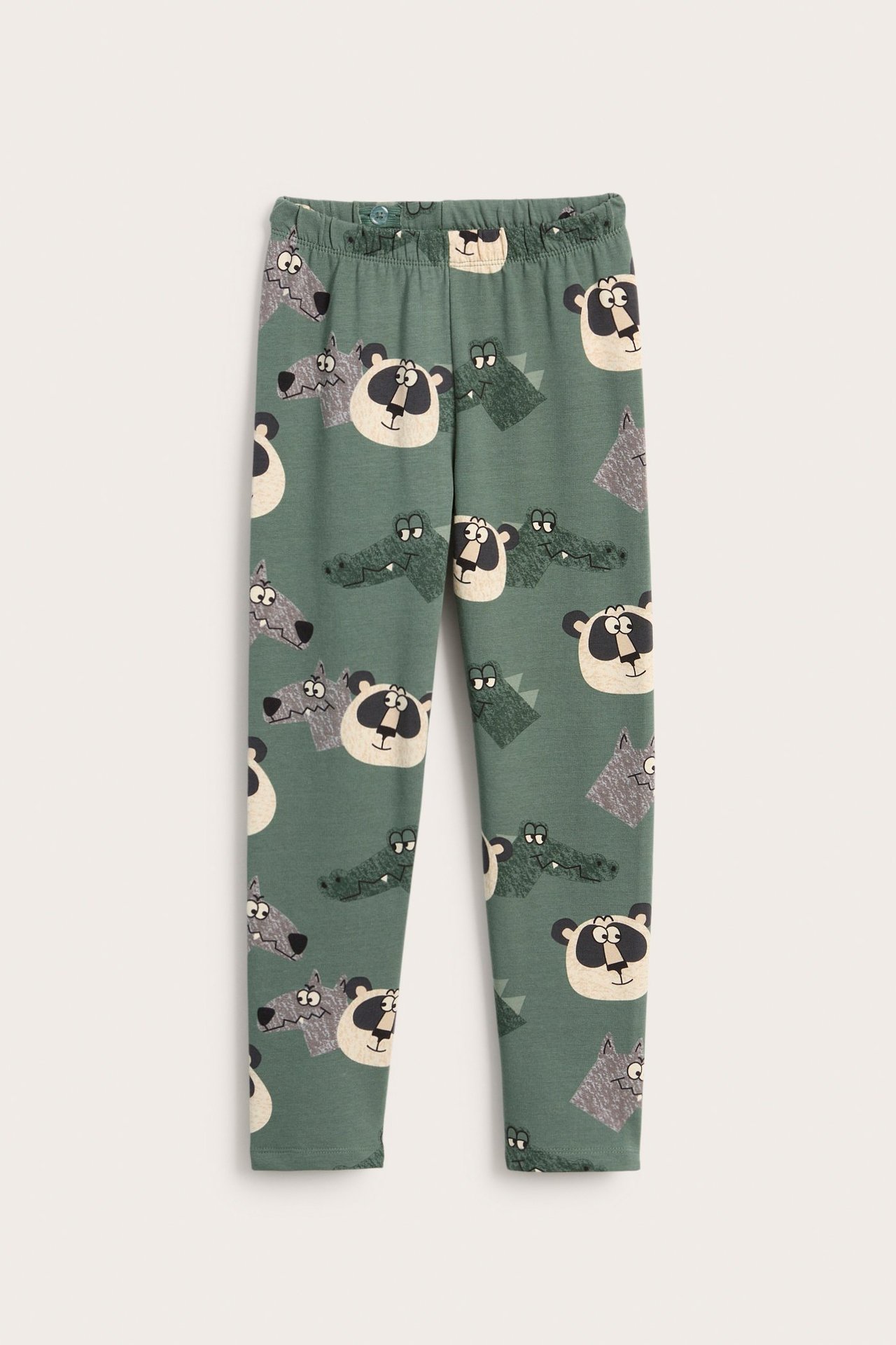 Framifrån: mörkgröna leggings i bomullsblandning för barn med djurmönster och resår i midjan.
