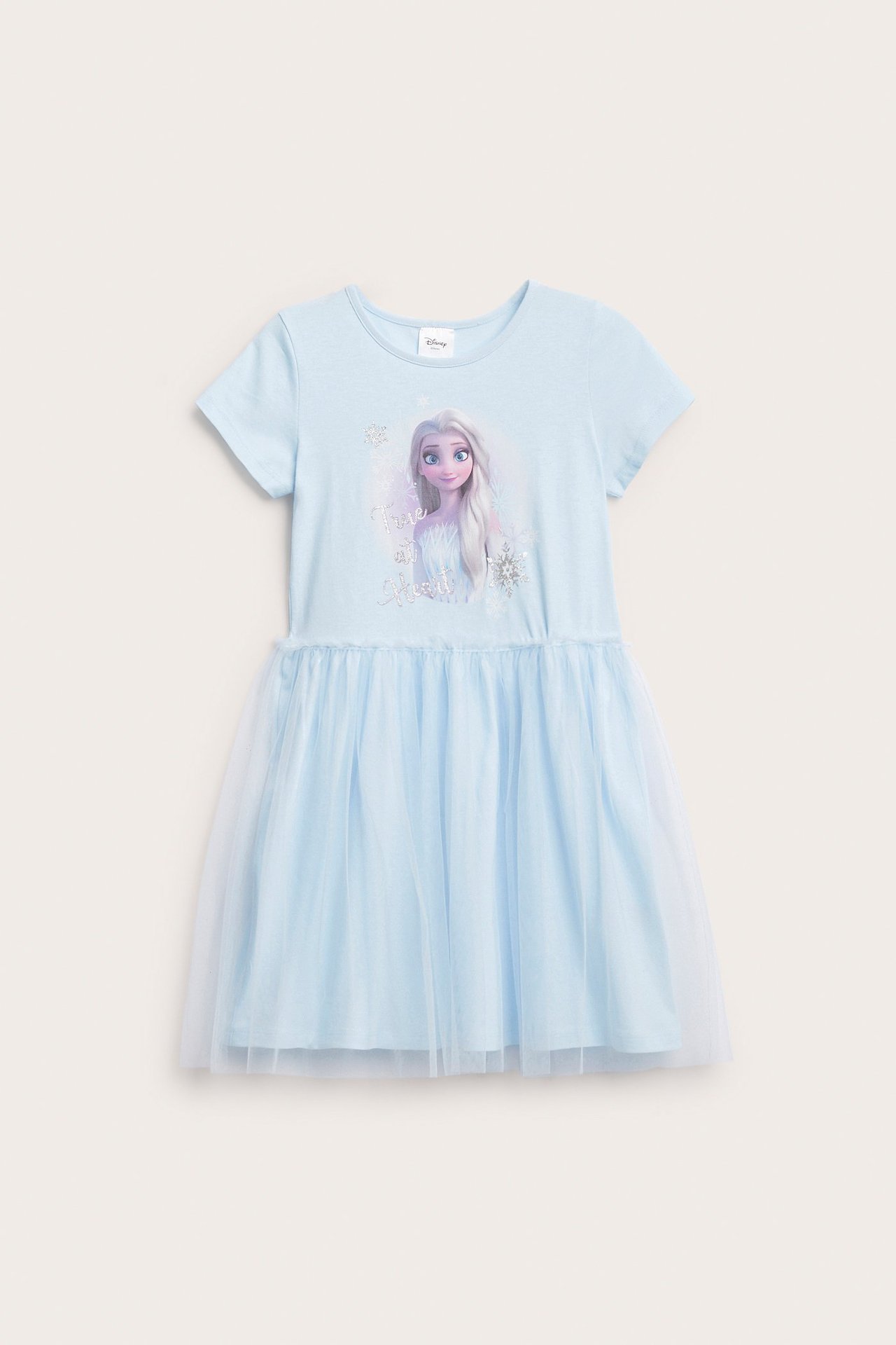 Frontvisning av en lys blå barnekjole i jersey med Frost Elsa-trykk og samlet tyllskjørt.