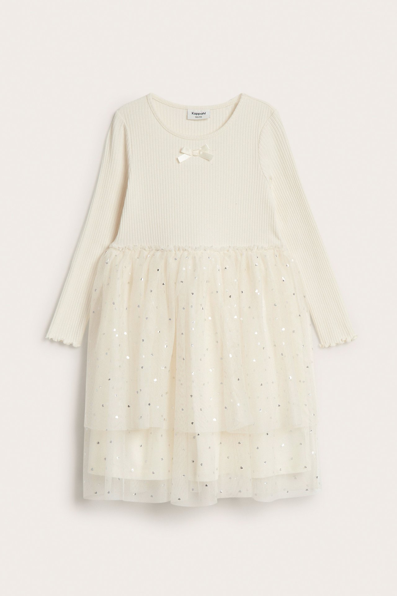 Widok z przodu: Dziecięca sukienka off-white z prążkowaną górą, kokardą i warstwową tiulową spódnicą, srebrne kropki.