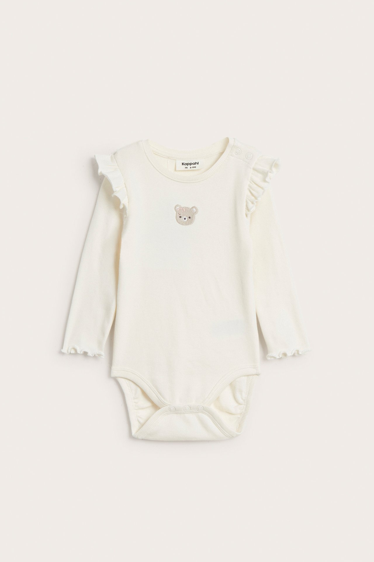Ribbestrikket body med volang