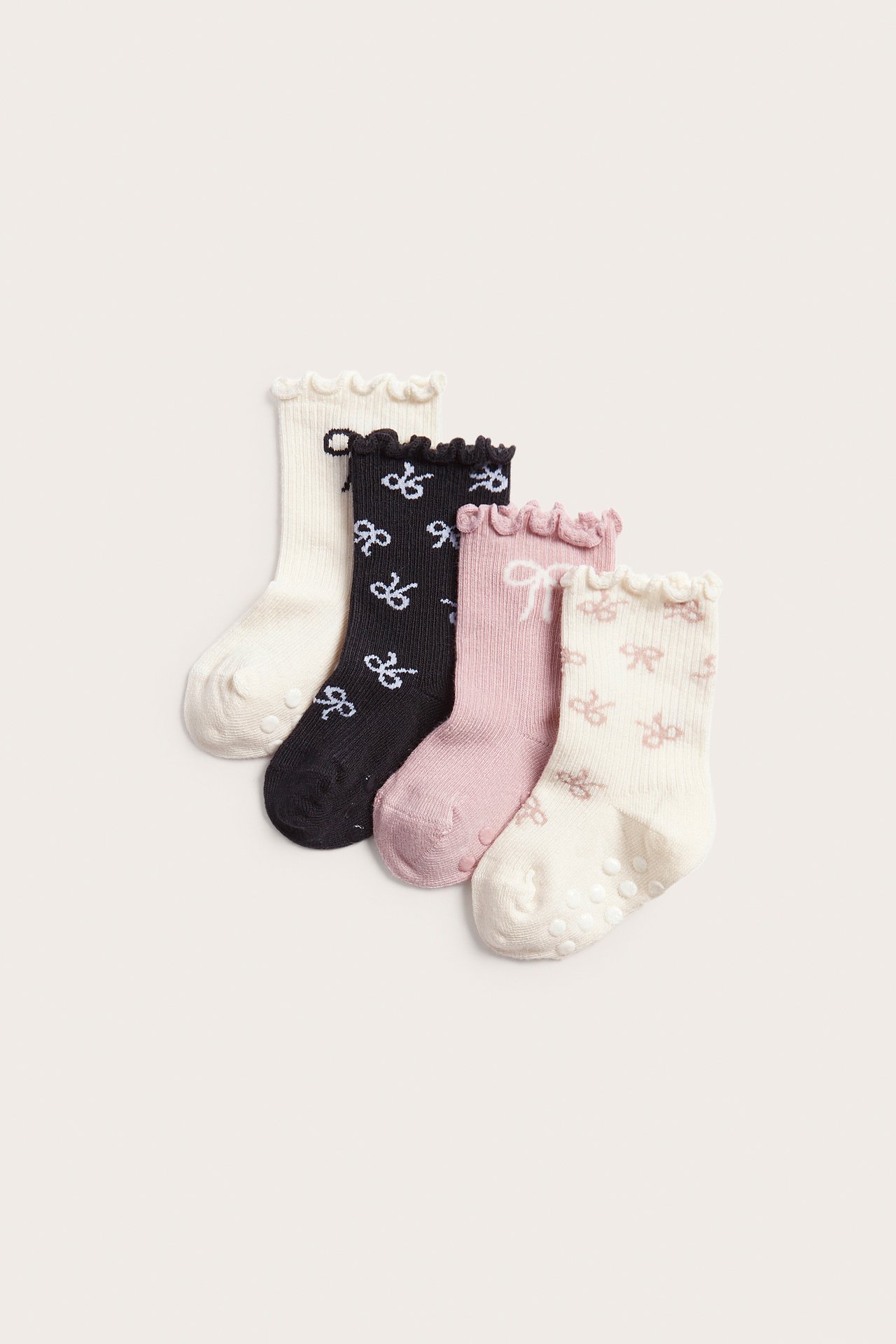 Strumpor 4-pack med rosetter