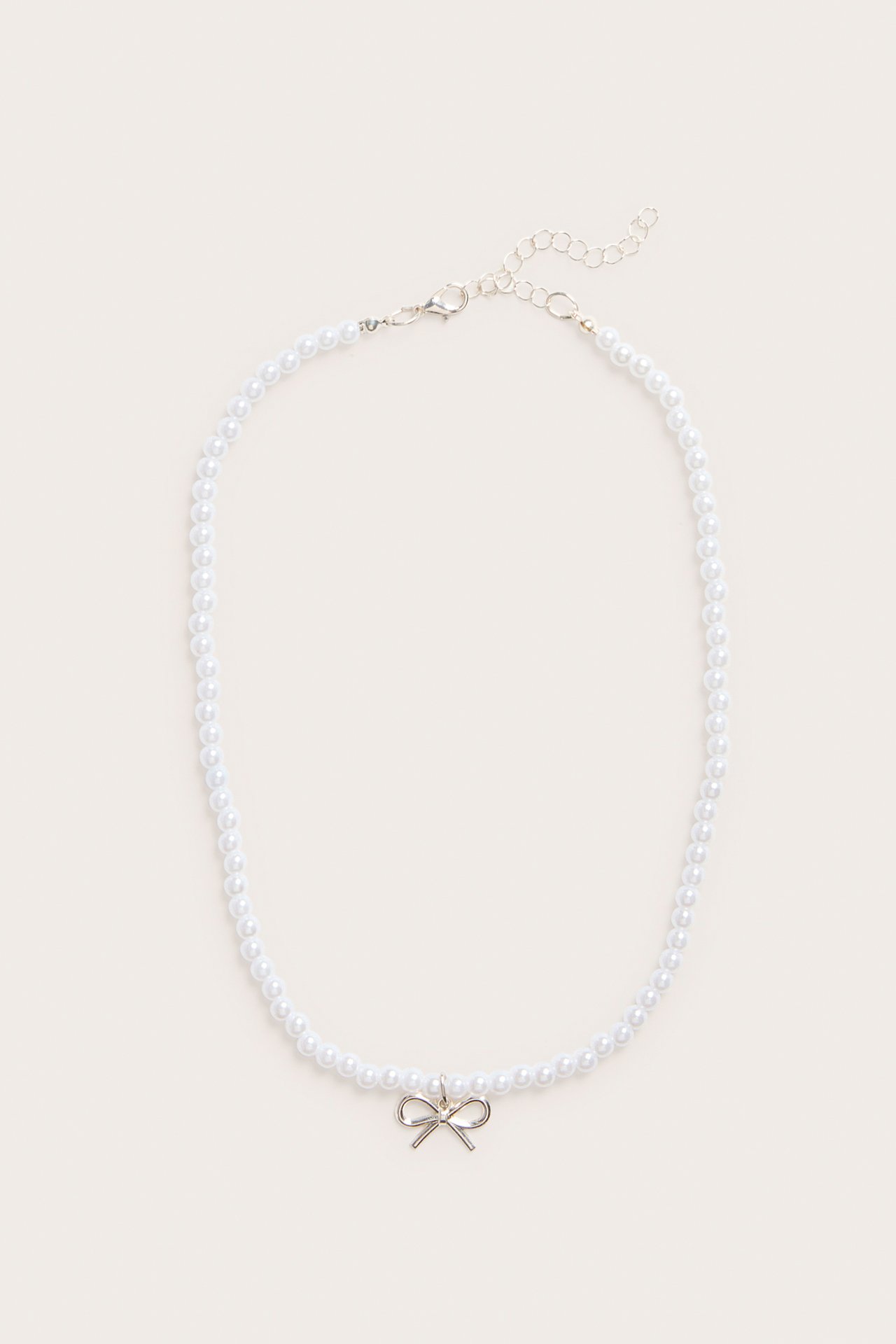 Pärlhalsband med berlock