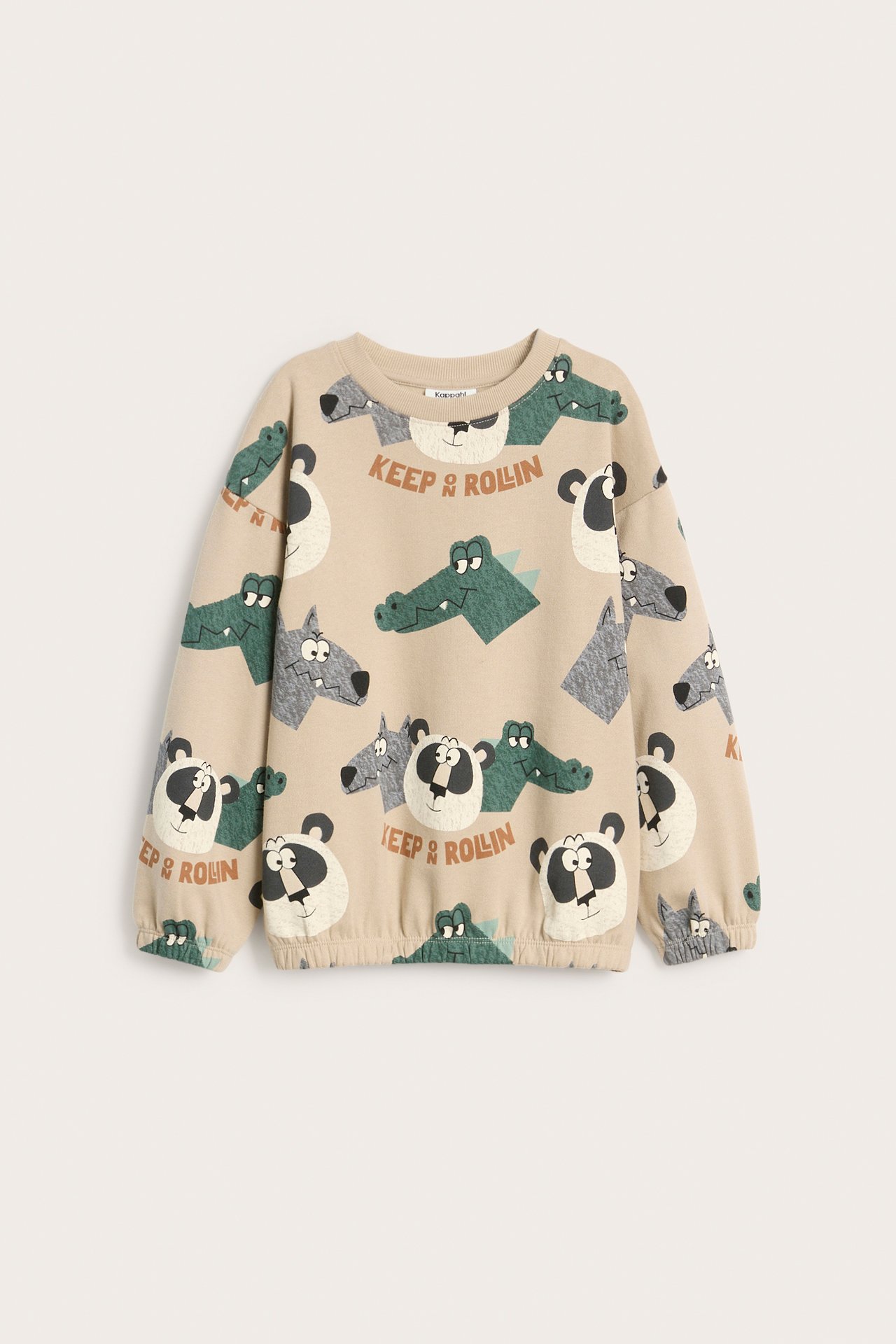 Framifrån, beige bomullssweatshirt för barn med heltäckande djurmönster och texten 'KEEP & ROLIN'.