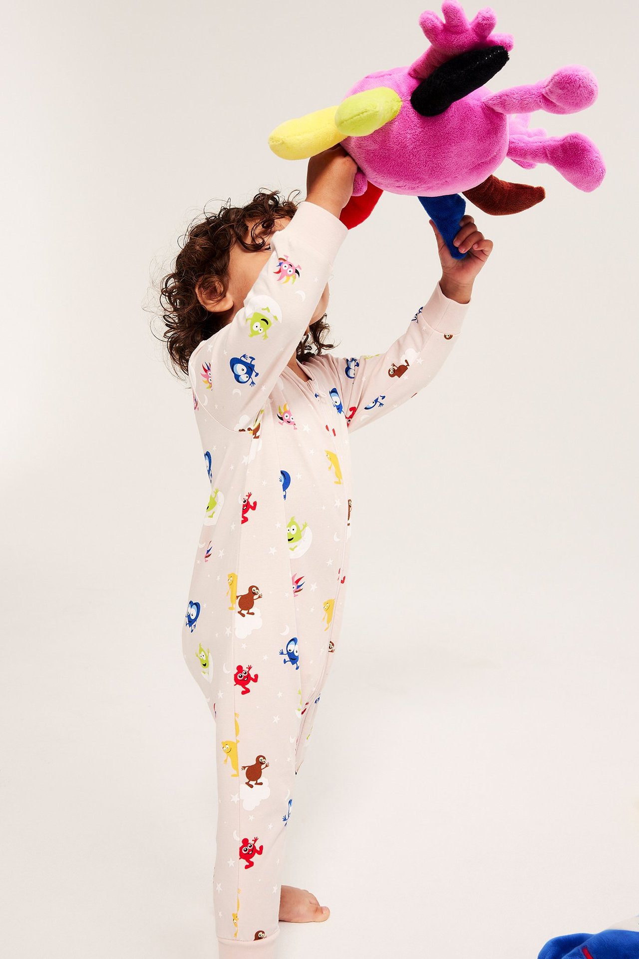 Babypyjamas med Babblarna-motiv i rosa med dragkedja fram, mönstrad.